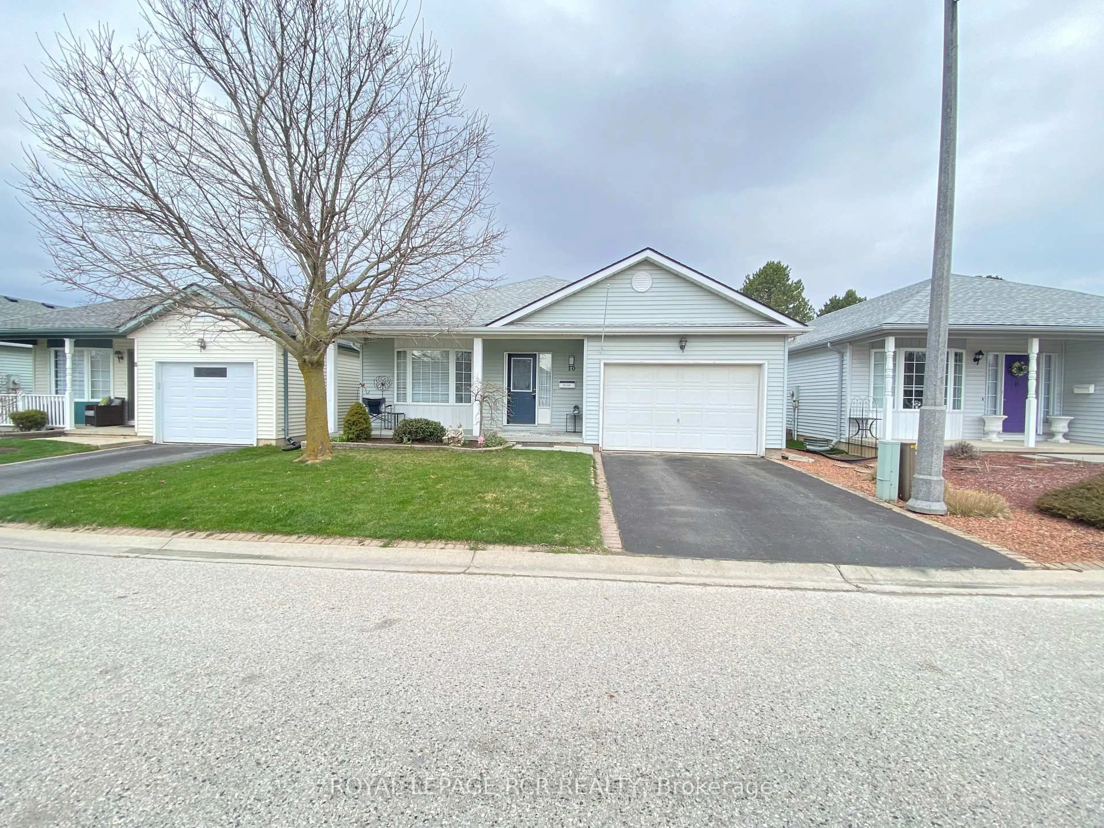 Home with vinyl exterior material, street for 10 Balazs Crt, Tillsonburg Ontario N4G 5V5
