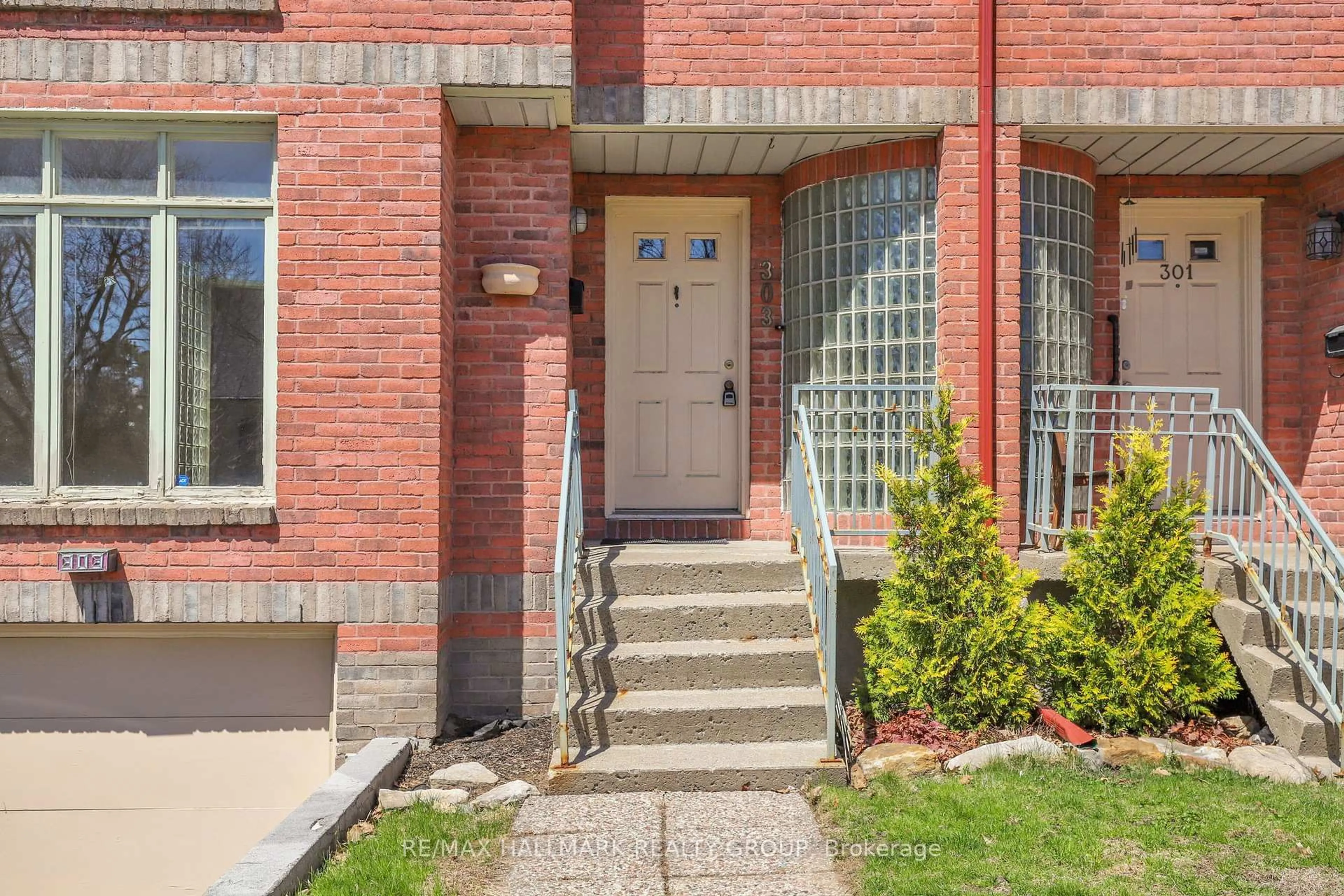 Home with brick exterior material, street for 303 Sherwood Dr, Ottawa Ontario K1Y 3W7