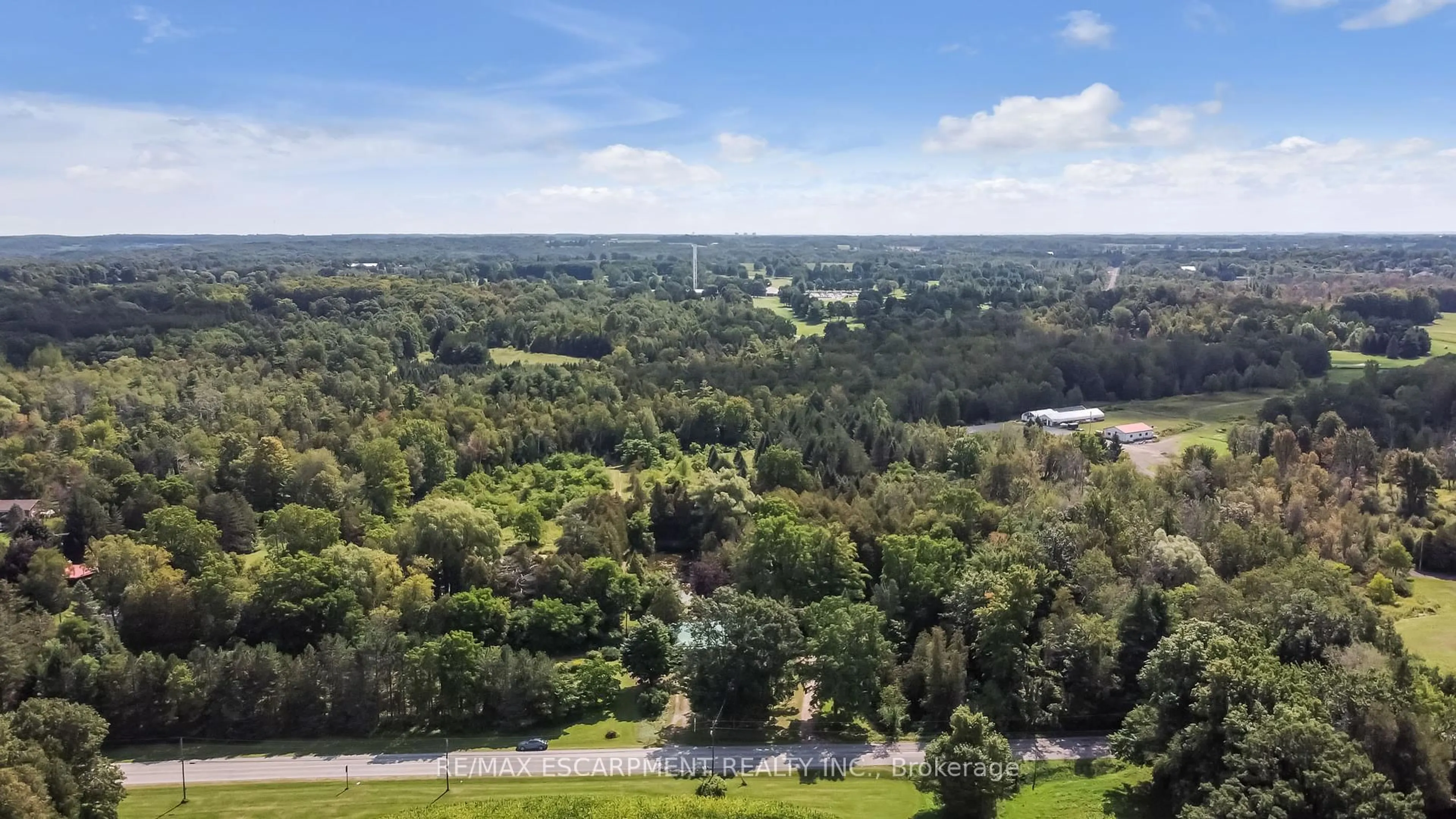 A pic from outside/outdoor area/front of a property/back of a property/a pic from drone, forest/trees view for 530 10th Concession Rd, Hamilton Ontario L0R 1H3
