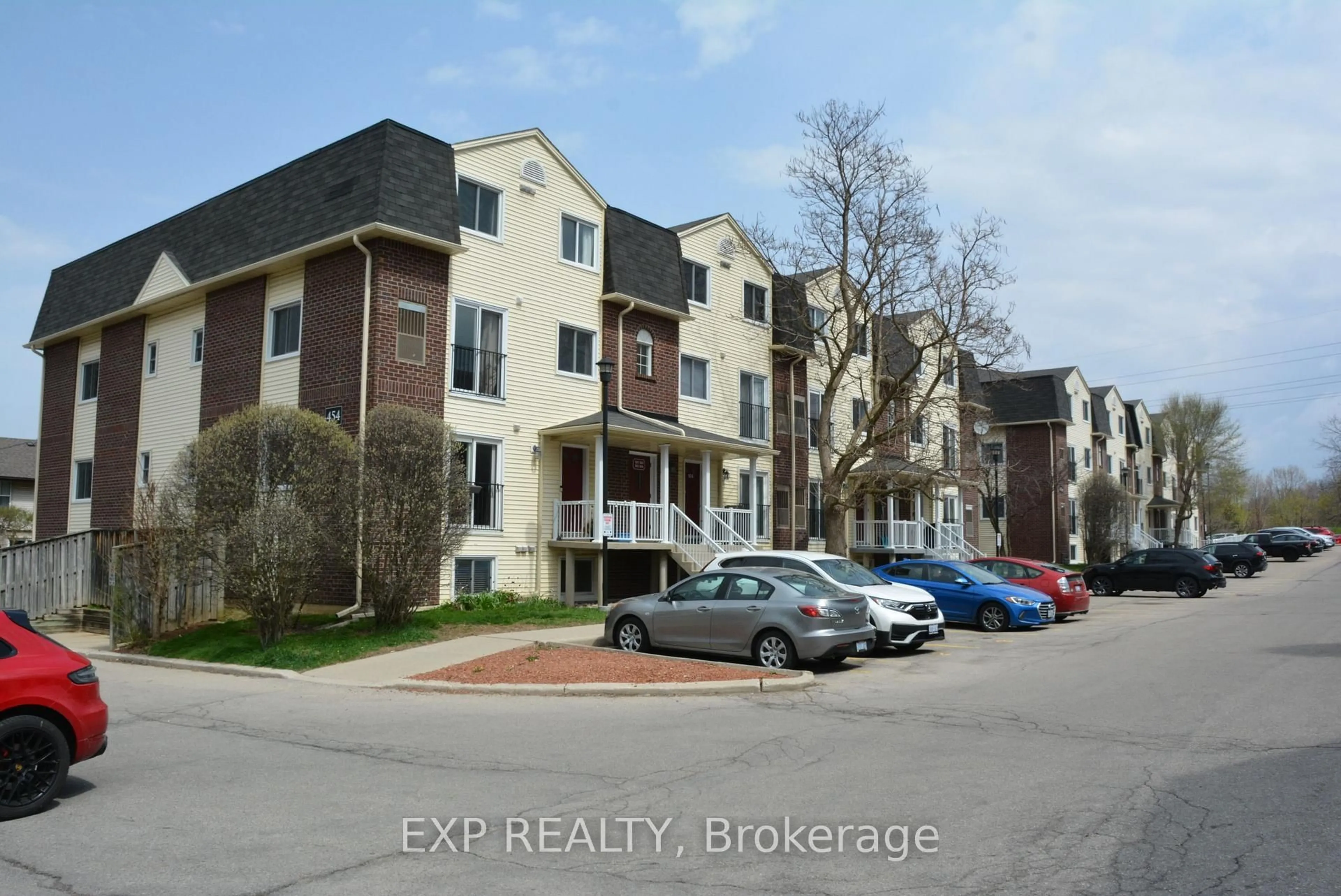 A pic from outside/outdoor area/front of a property/back of a property/a pic from drone, street for 454 Janefield Ave #202, Guelph Ontario N1G 4R8