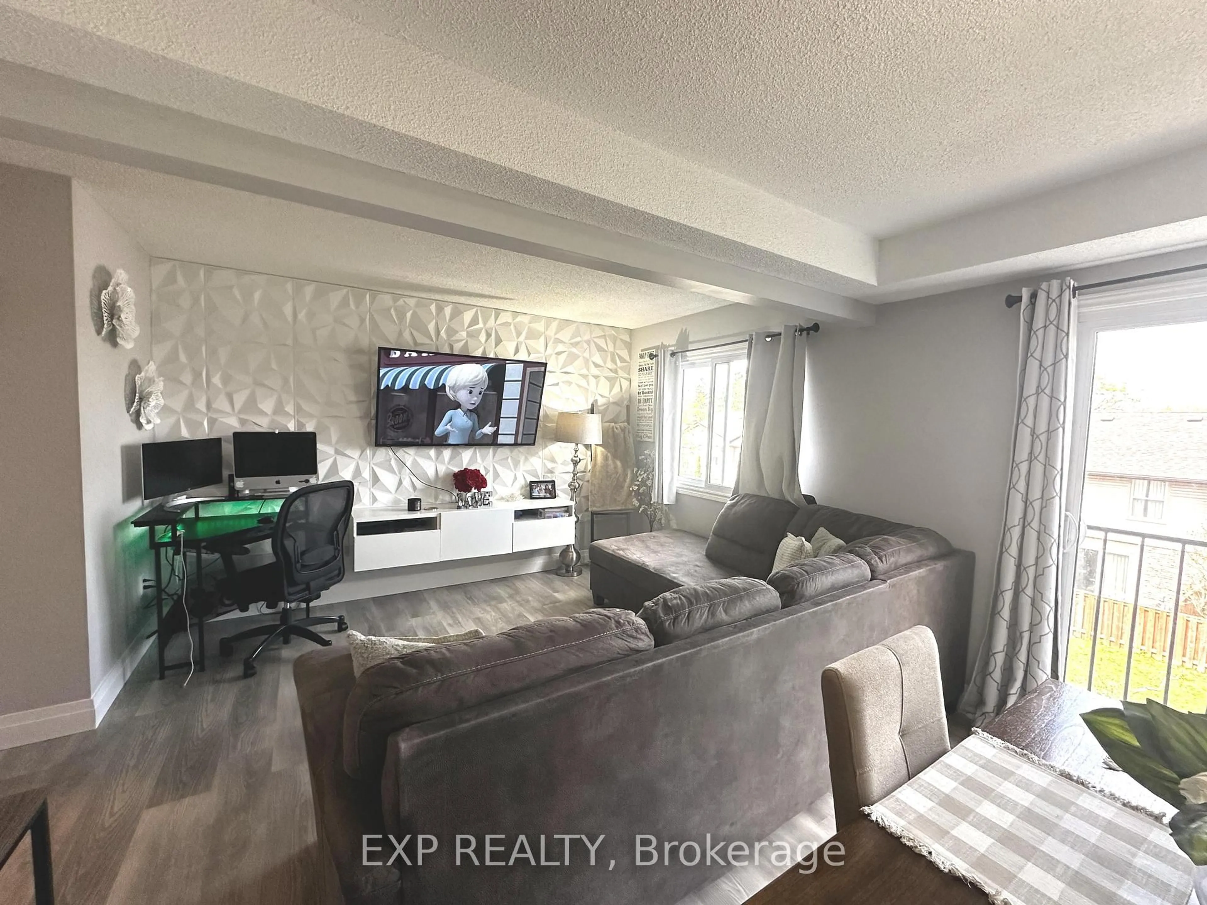 Living room with furniture, unknown for 454 Janefield Ave #202, Guelph Ontario N1G 4R8