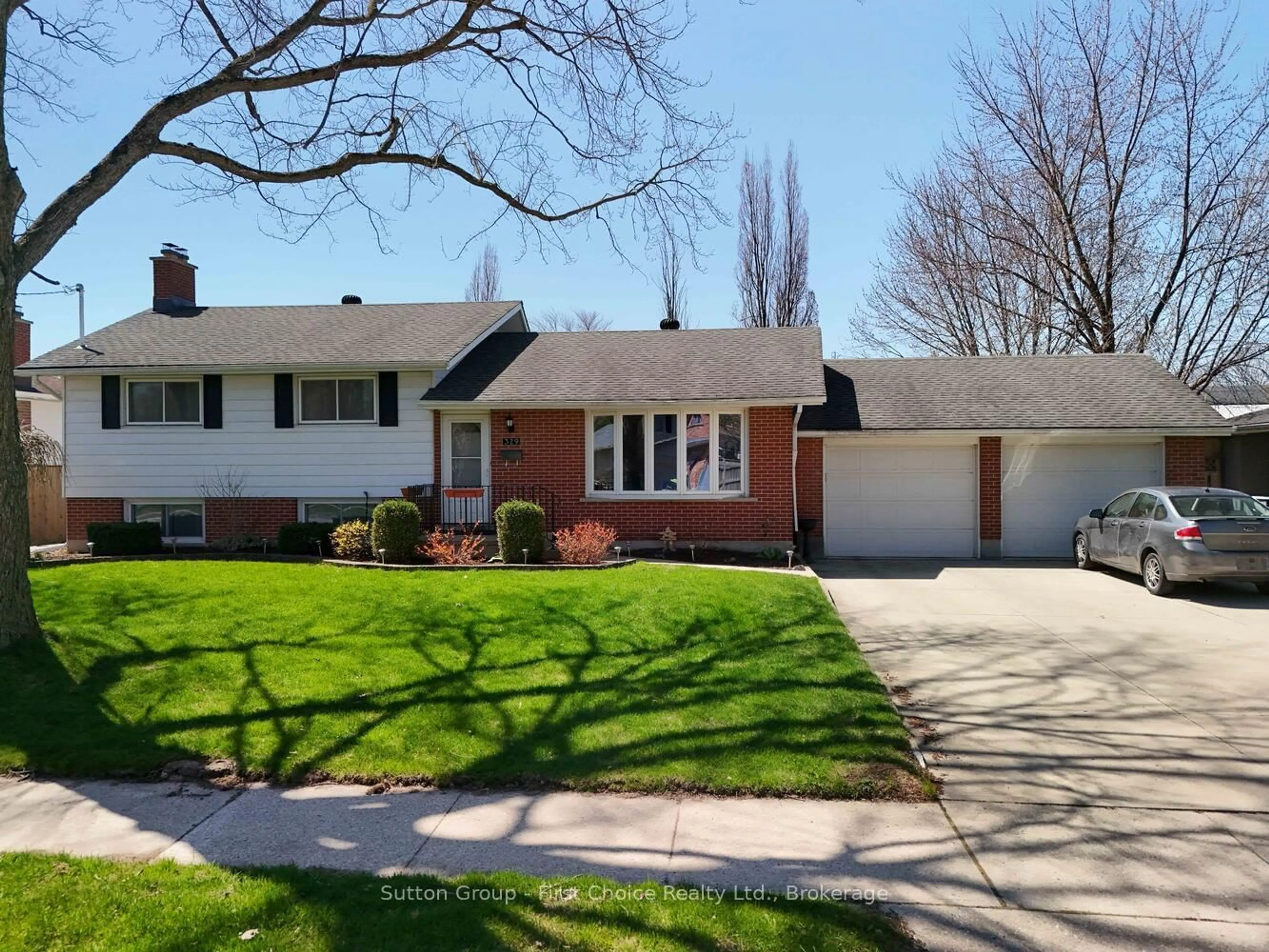 Home with vinyl exterior material, street for 329 Hibernia St, Stratford Ontario N5A 5V9