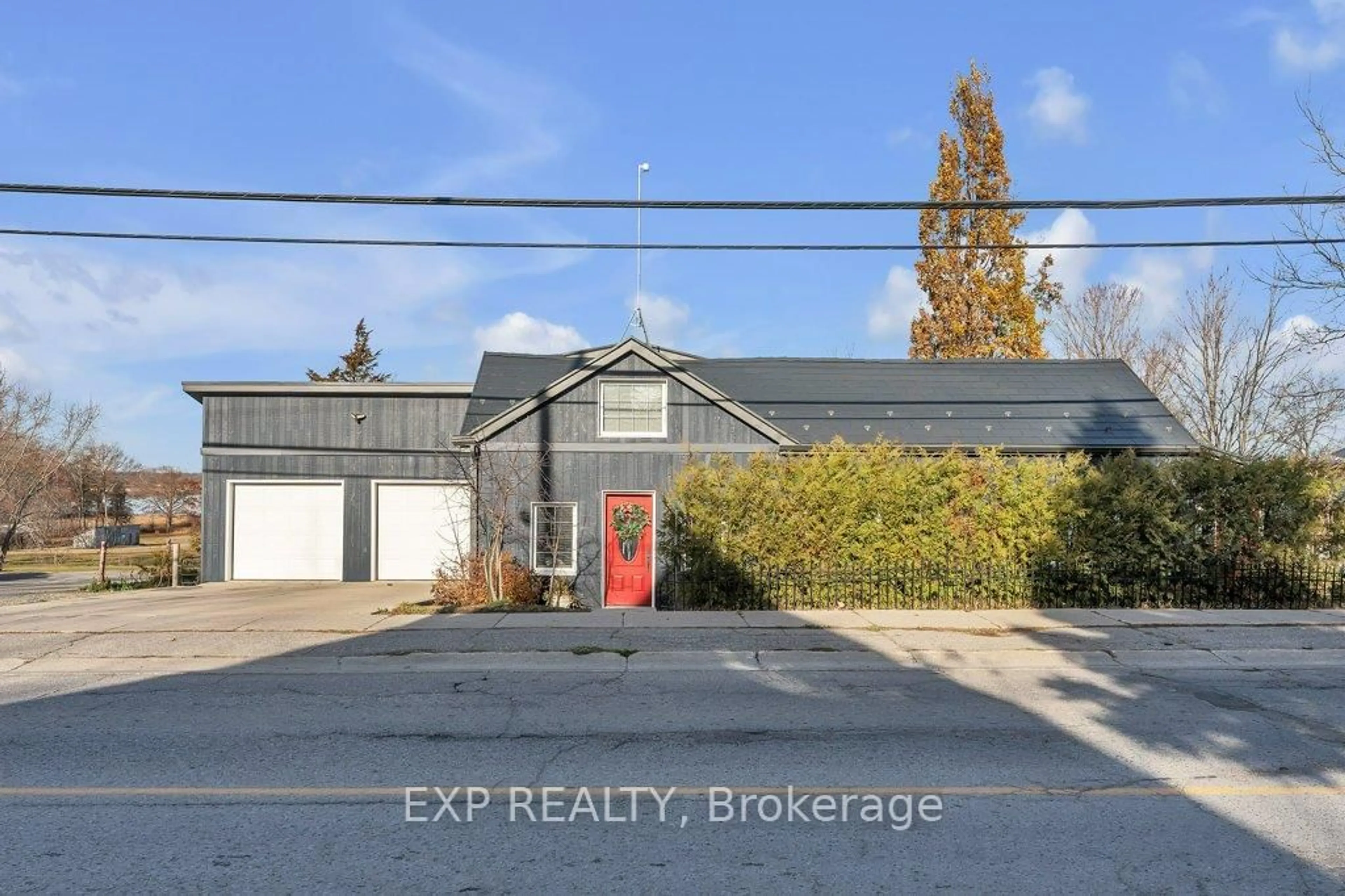 A pic from outside/outdoor area/front of a property/back of a property/a pic from drone, street for 1710 County Road 10 N/A, Prince Edward County Ontario K0K 1P0