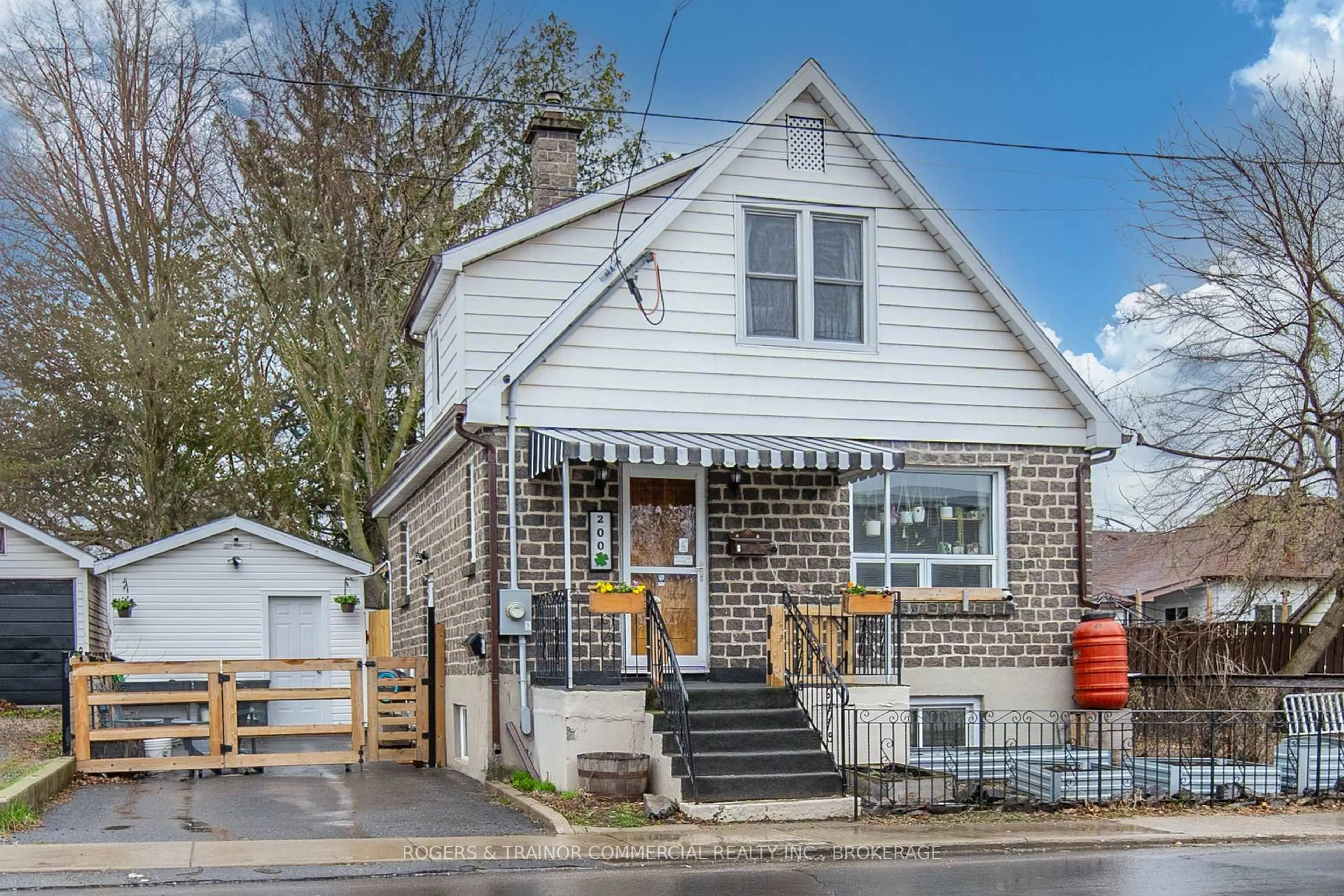 Home with vinyl exterior material, street for 200 Patrick St, Kingston Ontario K7K 3P5