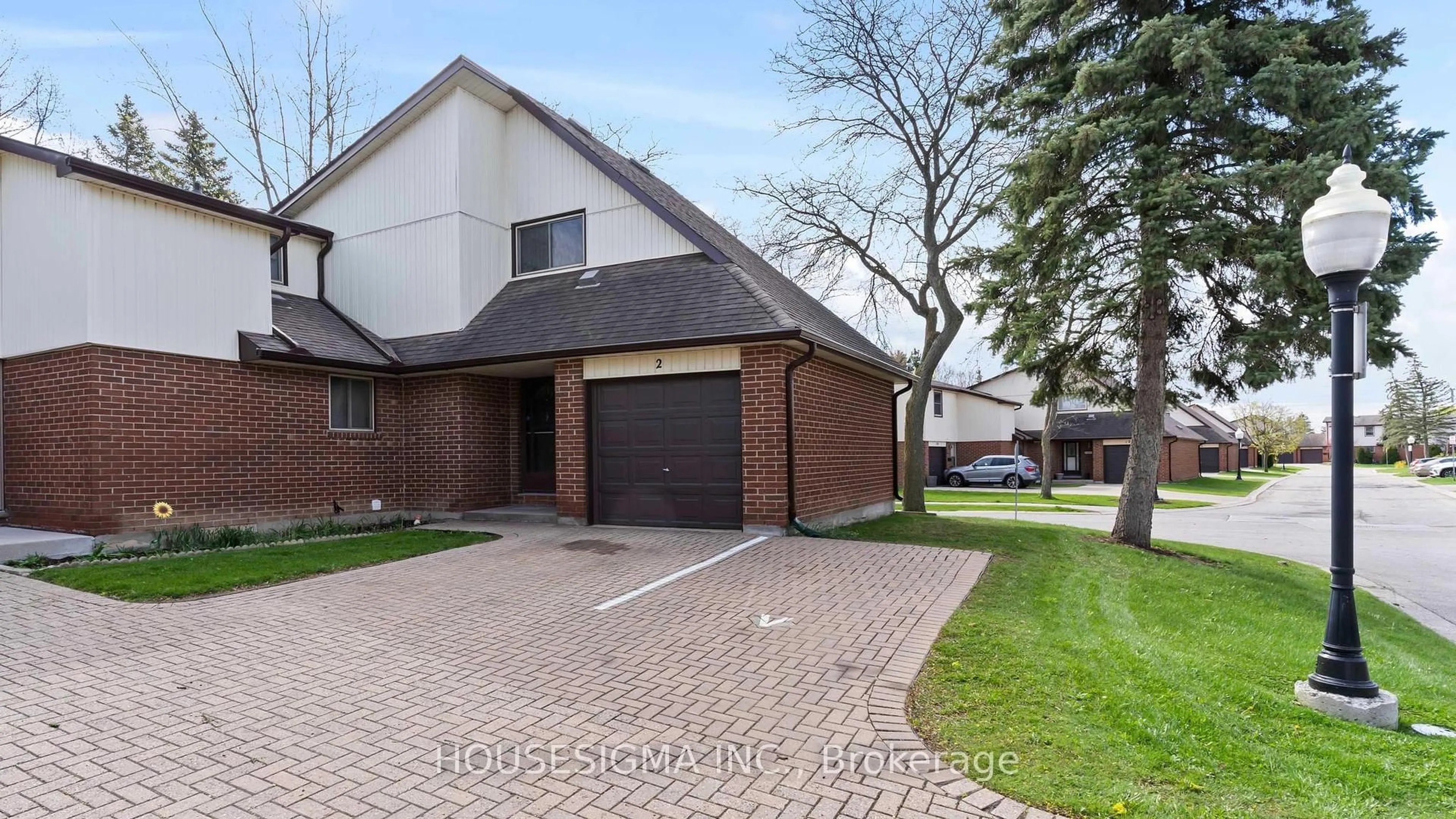 Home with brick exterior material, street for 971 Adelaide St #2, London South Ontario N6E 2H3