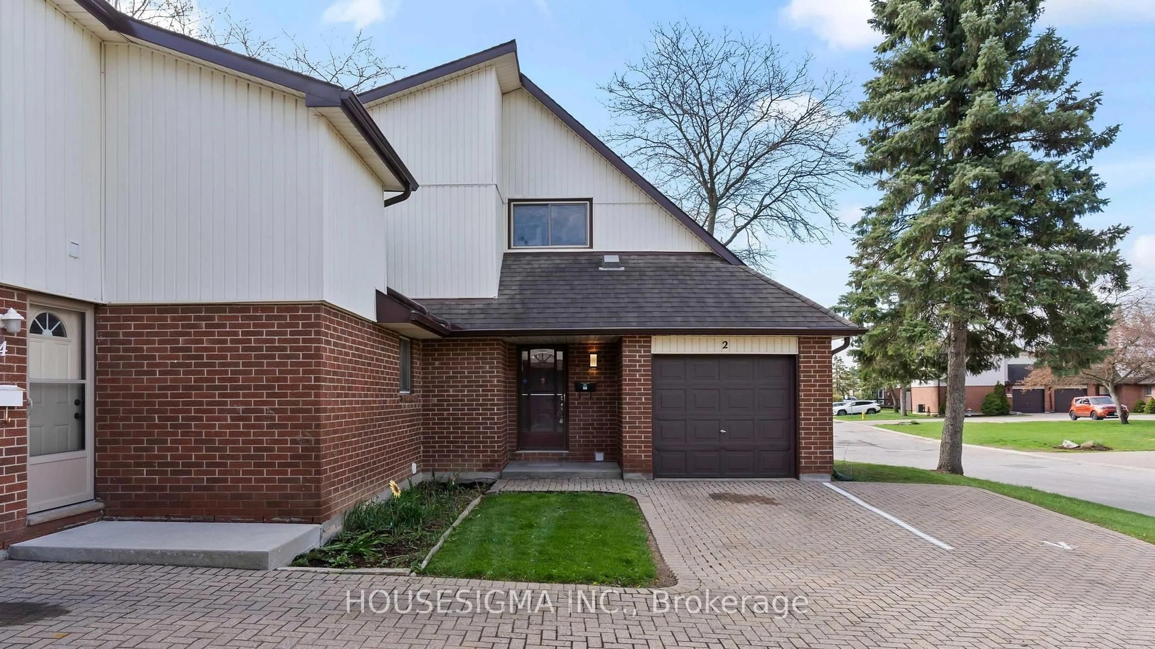 Home with brick exterior material, street for 971 Adelaide St #2, London South Ontario N6E 2H3