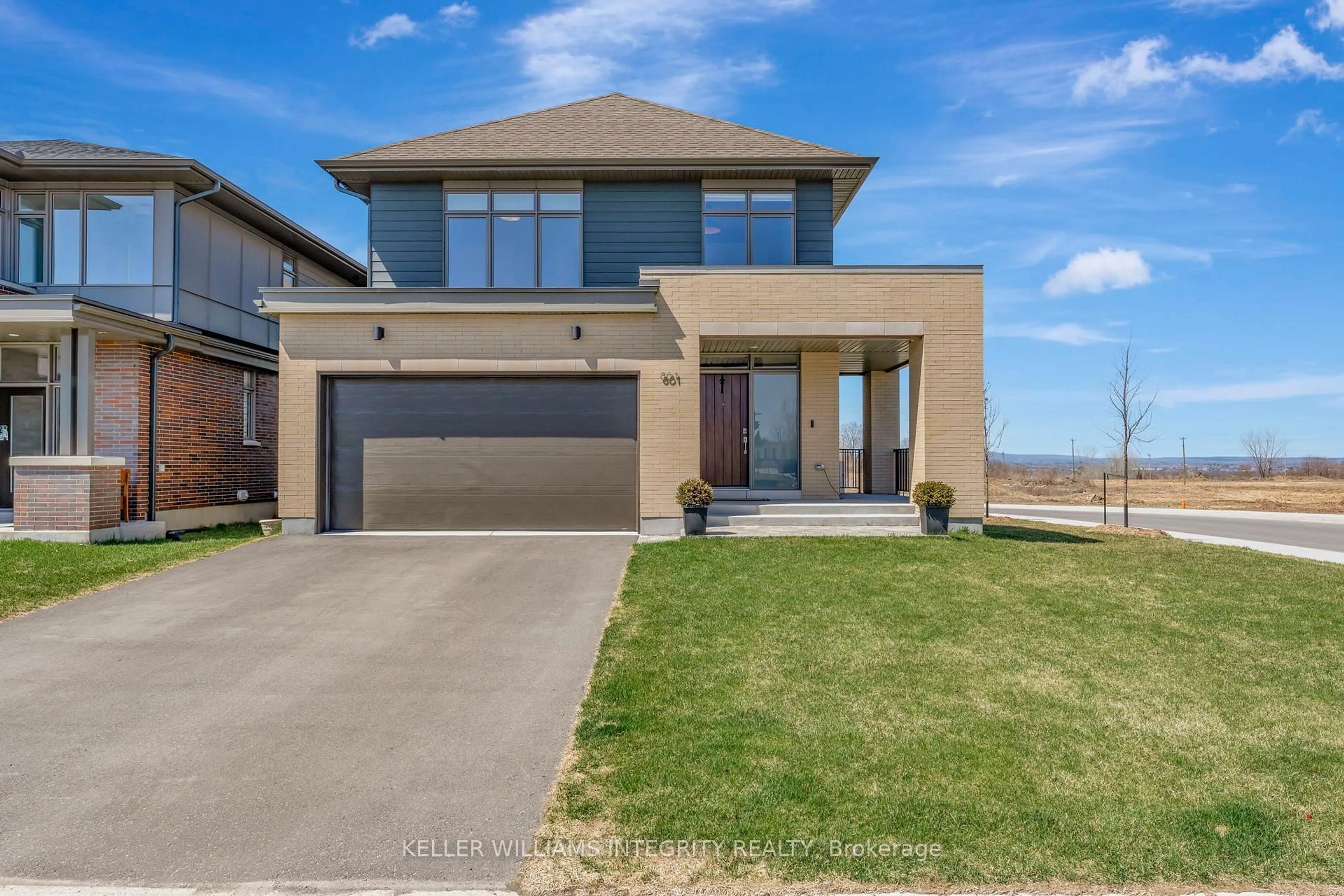 Home with brick exterior material, street for 861 Moses Tennisco St, Ottawa Ontario K1K 5A2