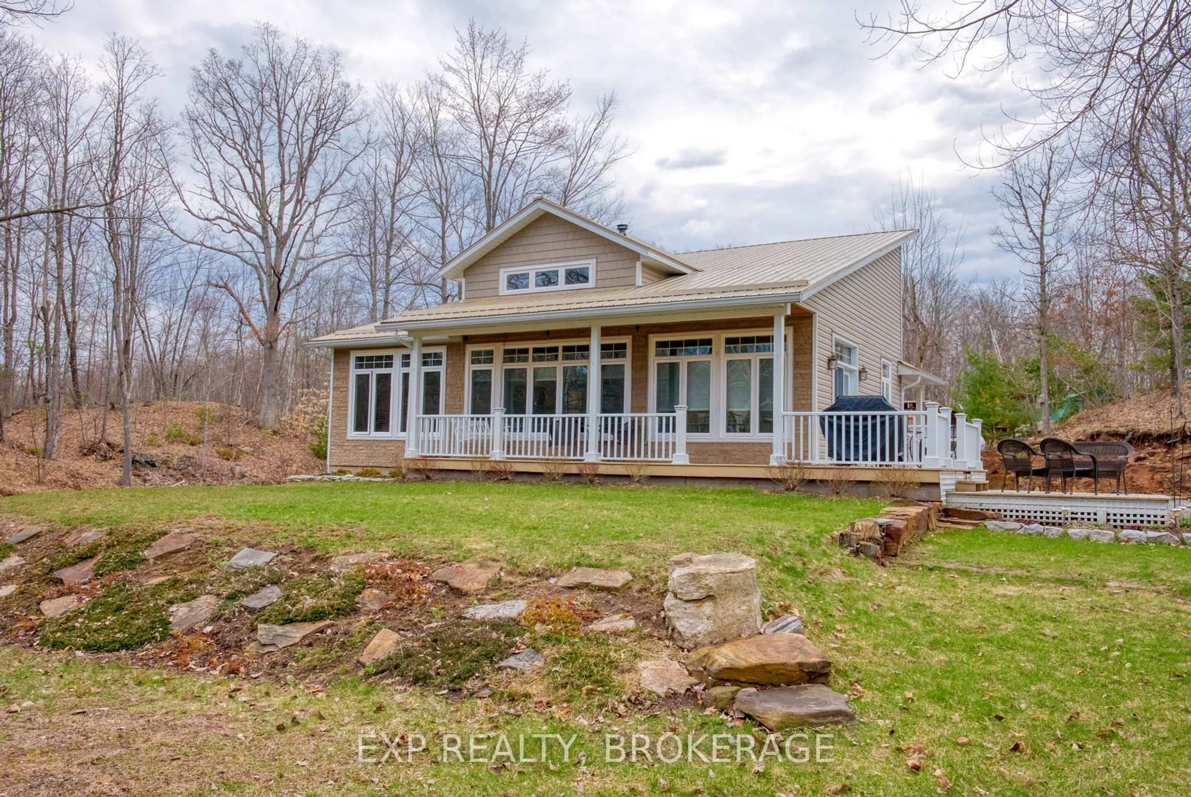 A pic from outside/outdoor area/front of a property/back of a property/a pic from drone, water/lake/river/ocean view for 173 Castle Rock Lane, Tamworth Ontario K0K 3G0