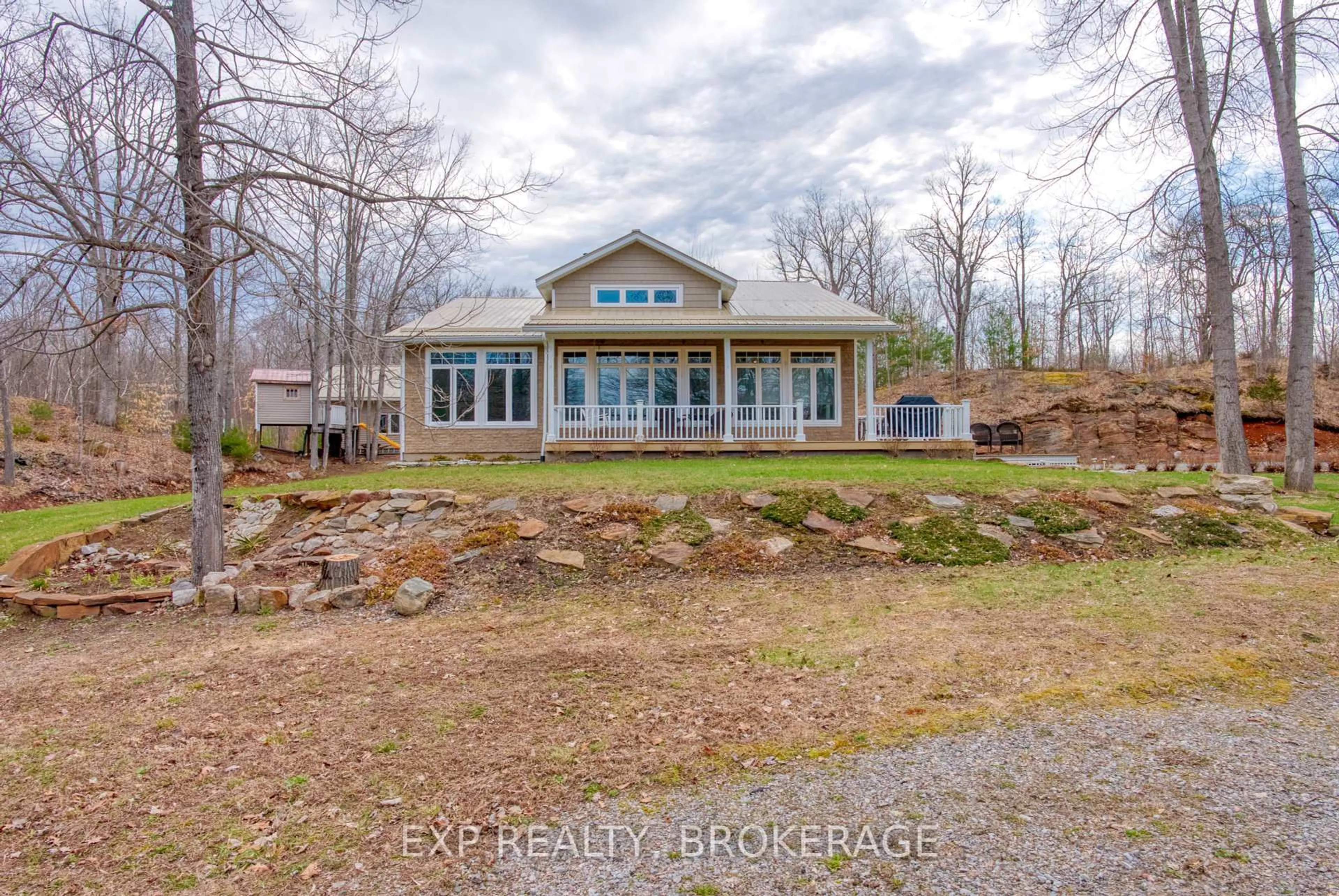 A pic from outside/outdoor area/front of a property/back of a property/a pic from drone, water/lake/river/ocean view for 173 Castle Rock Lane, Tamworth Ontario K0K 3G0
