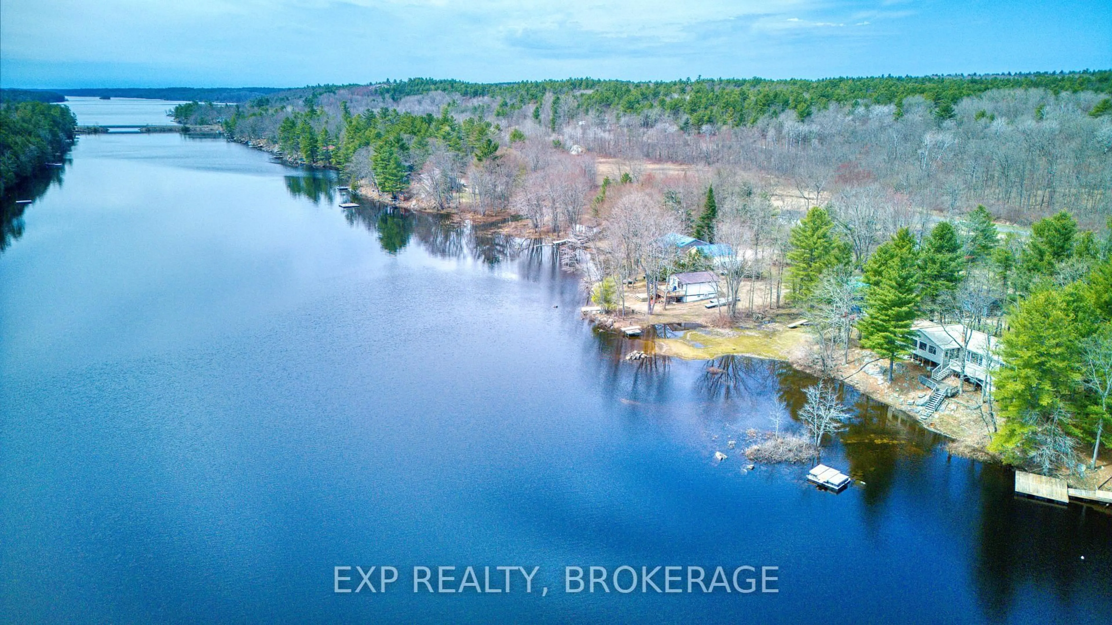A pic from outside/outdoor area/front of a property/back of a property/a pic from drone, water/lake/river/ocean view for 1040 Turner Way, Arden Ontario K0H 1B0