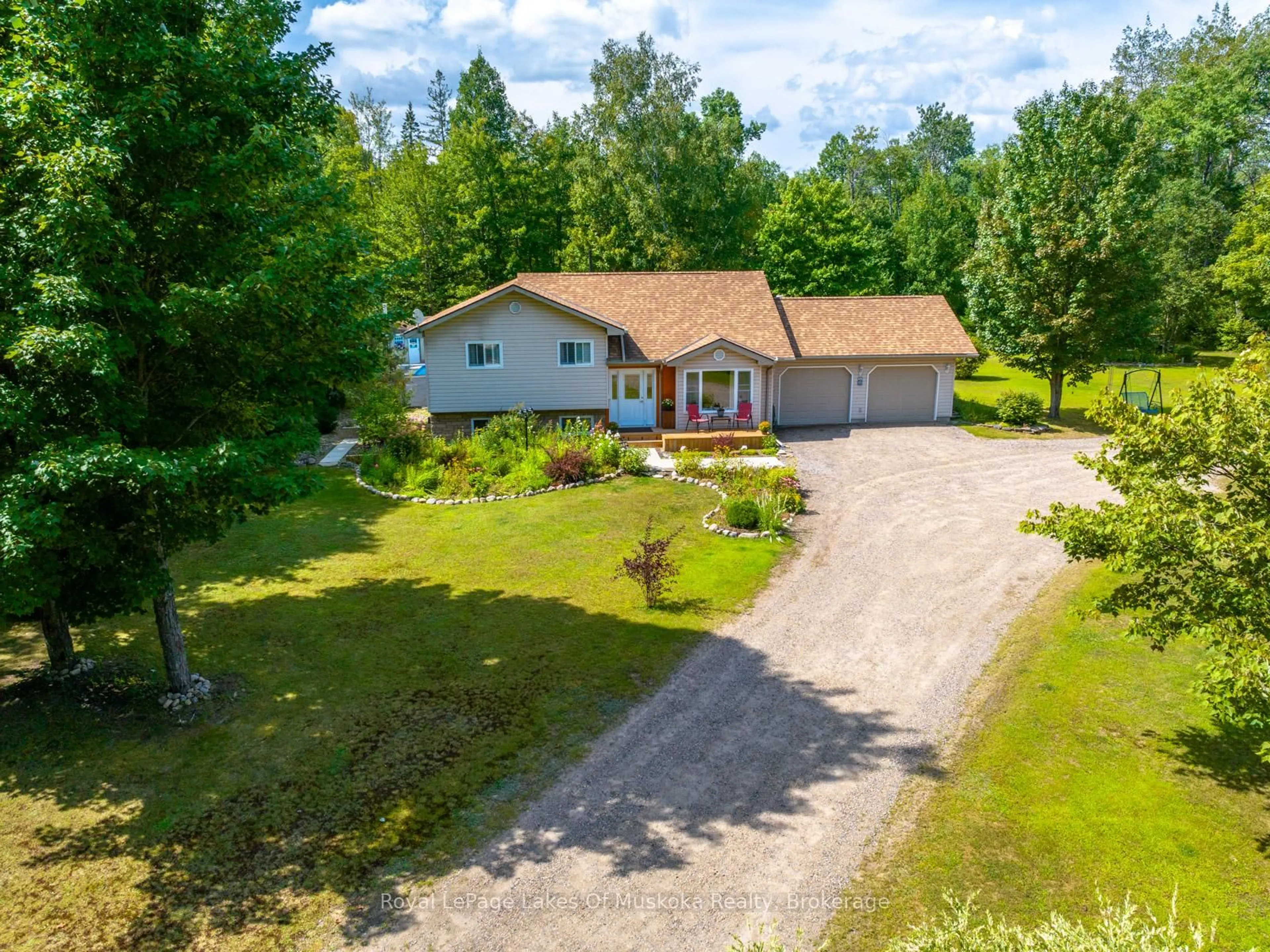 A pic from outside/outdoor area/front of a property/back of a property/a pic from drone, street for 42 Homeland Dr, Perry Ontario P0A 1J0