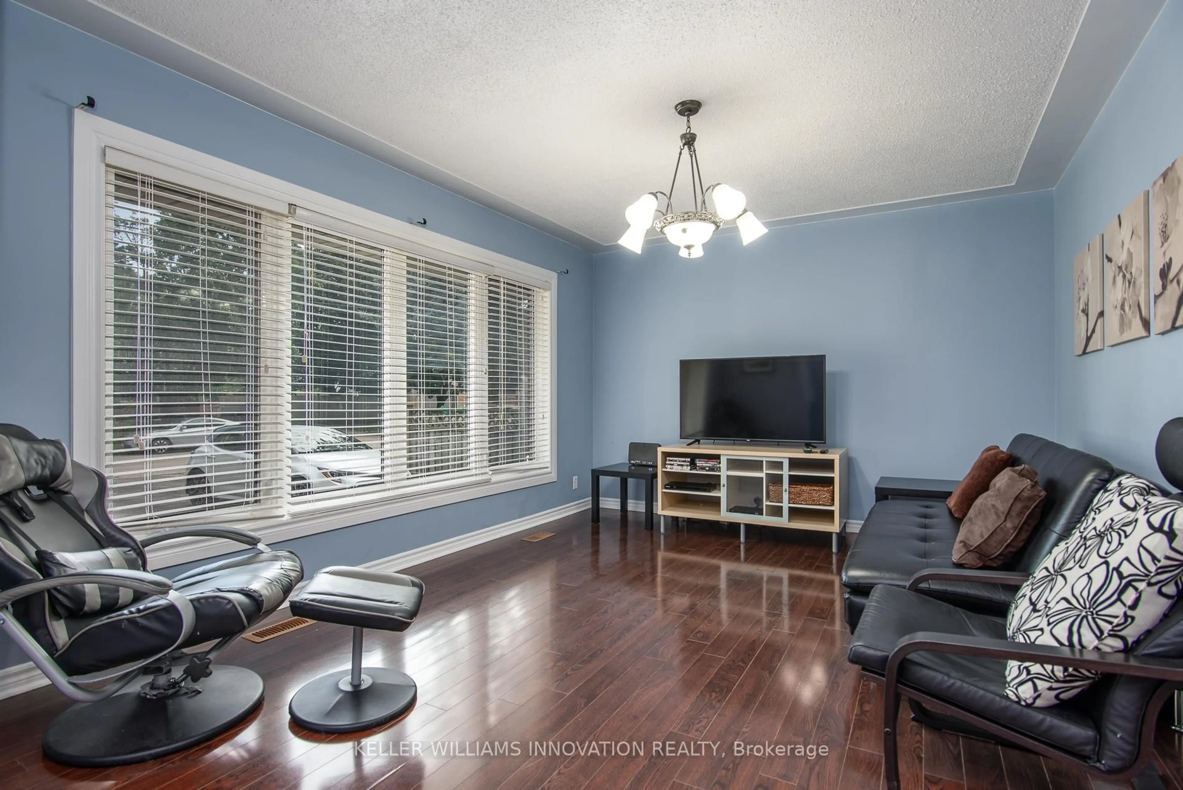 Living room with furniture, wood/laminate floor for 80 Clive Rd, Kitchener Ontario N2H 3N6
