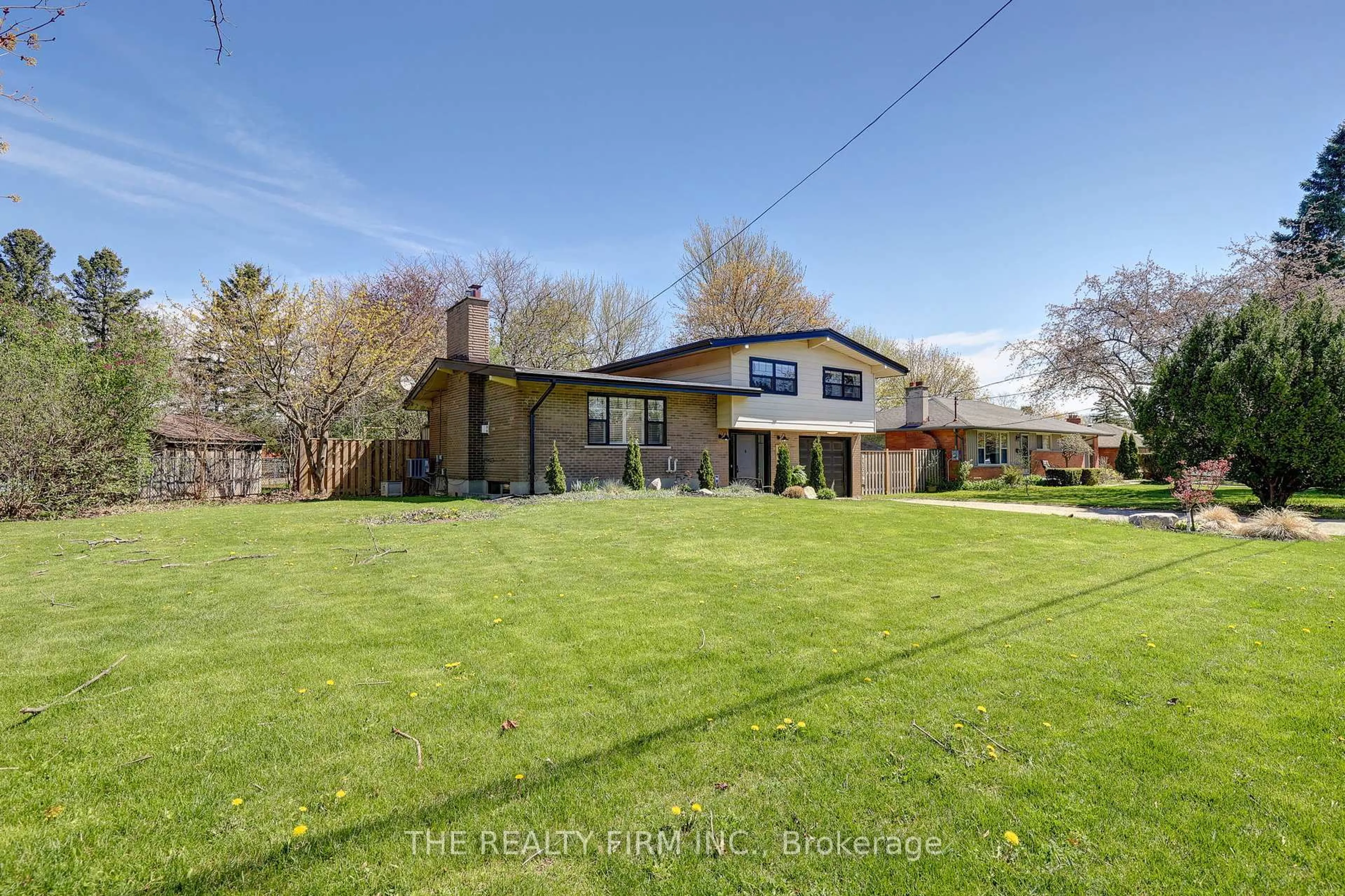 A pic from outside/outdoor area/front of a property/back of a property/a pic from drone, water/lake/river/ocean view for 541 Cypress Ave, London North Ontario N6H 3R4