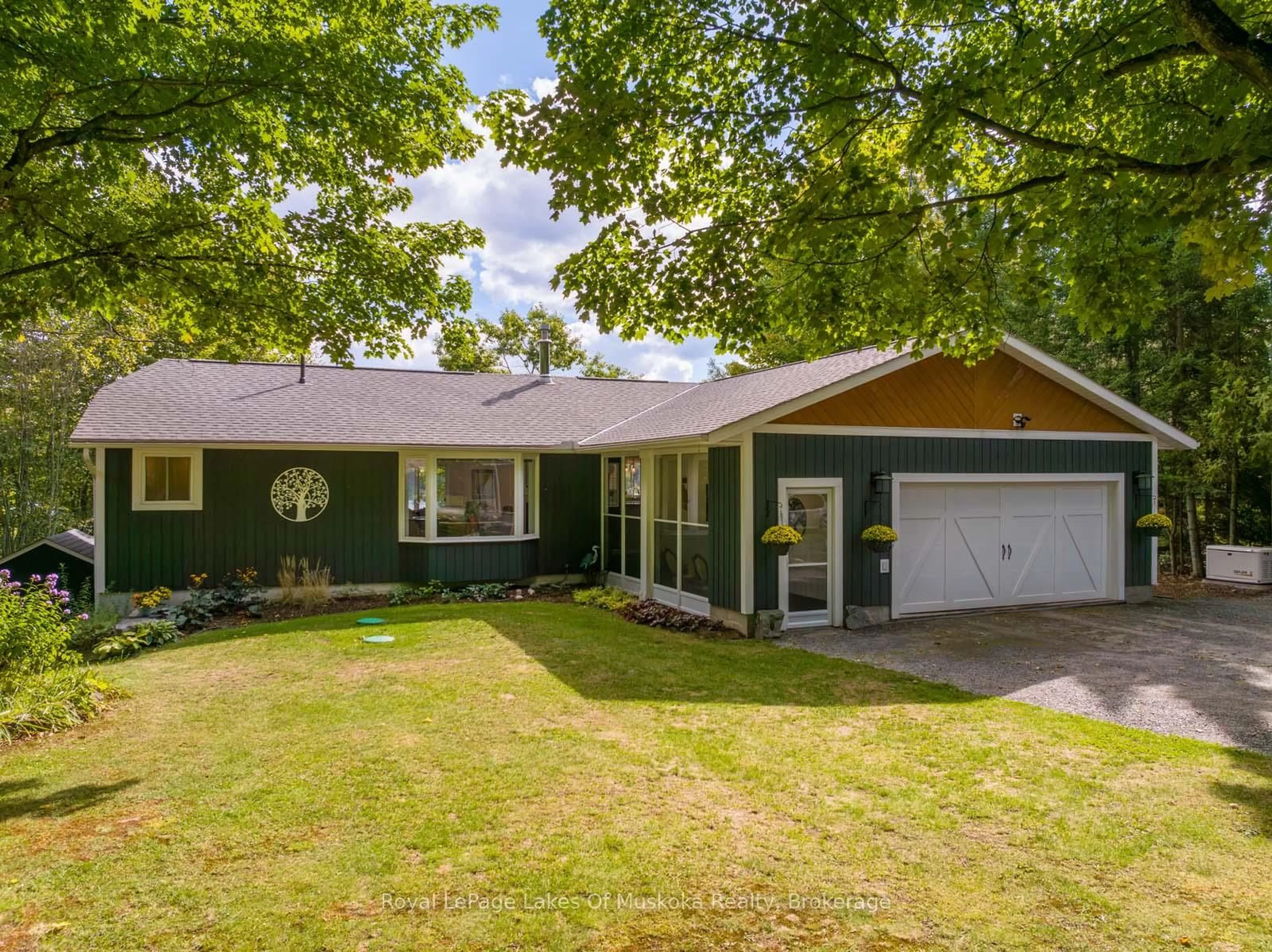 Home with vinyl exterior material, street for 524 HOMELAND Dr, Perry Ontario P0A 1J0