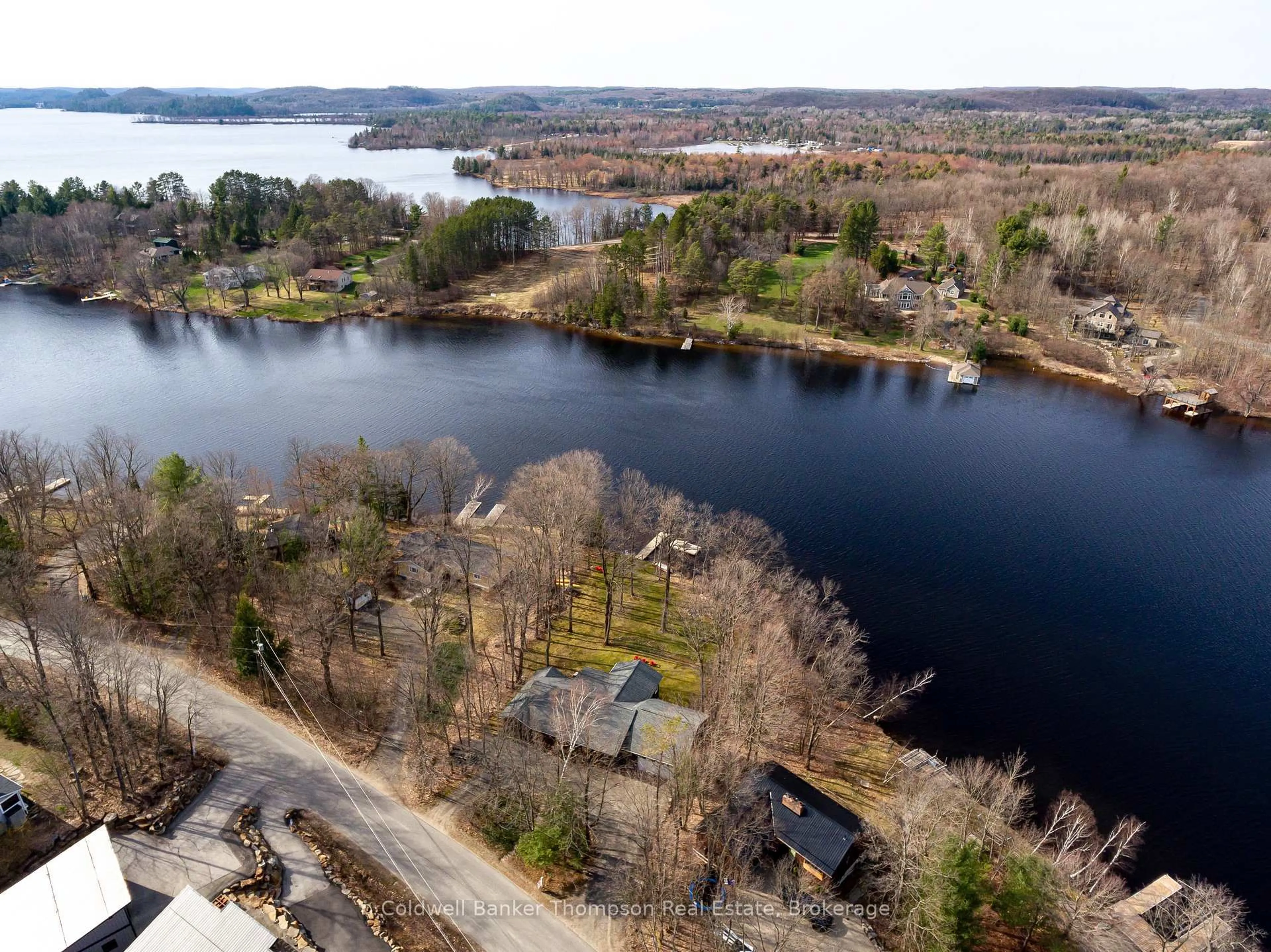 A pic from outside/outdoor area/front of a property/back of a property/a pic from drone, water/lake/river/ocean view for 440 Bayshore Blvd, Huntsville Ontario P1H 1Z1