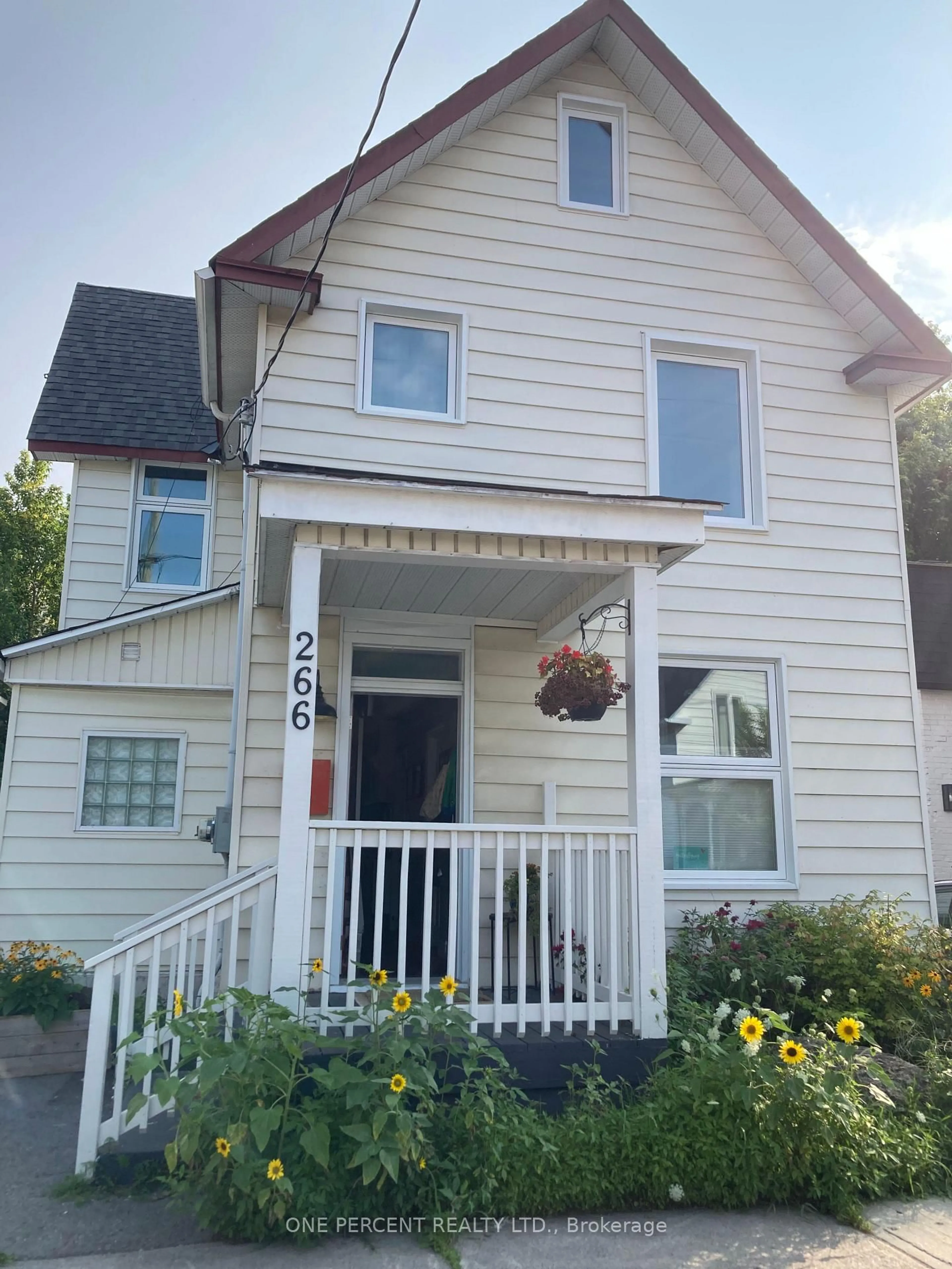 Home with vinyl exterior material, street for 266 Bradley Ave, Ottawa Ontario K1L 7E9