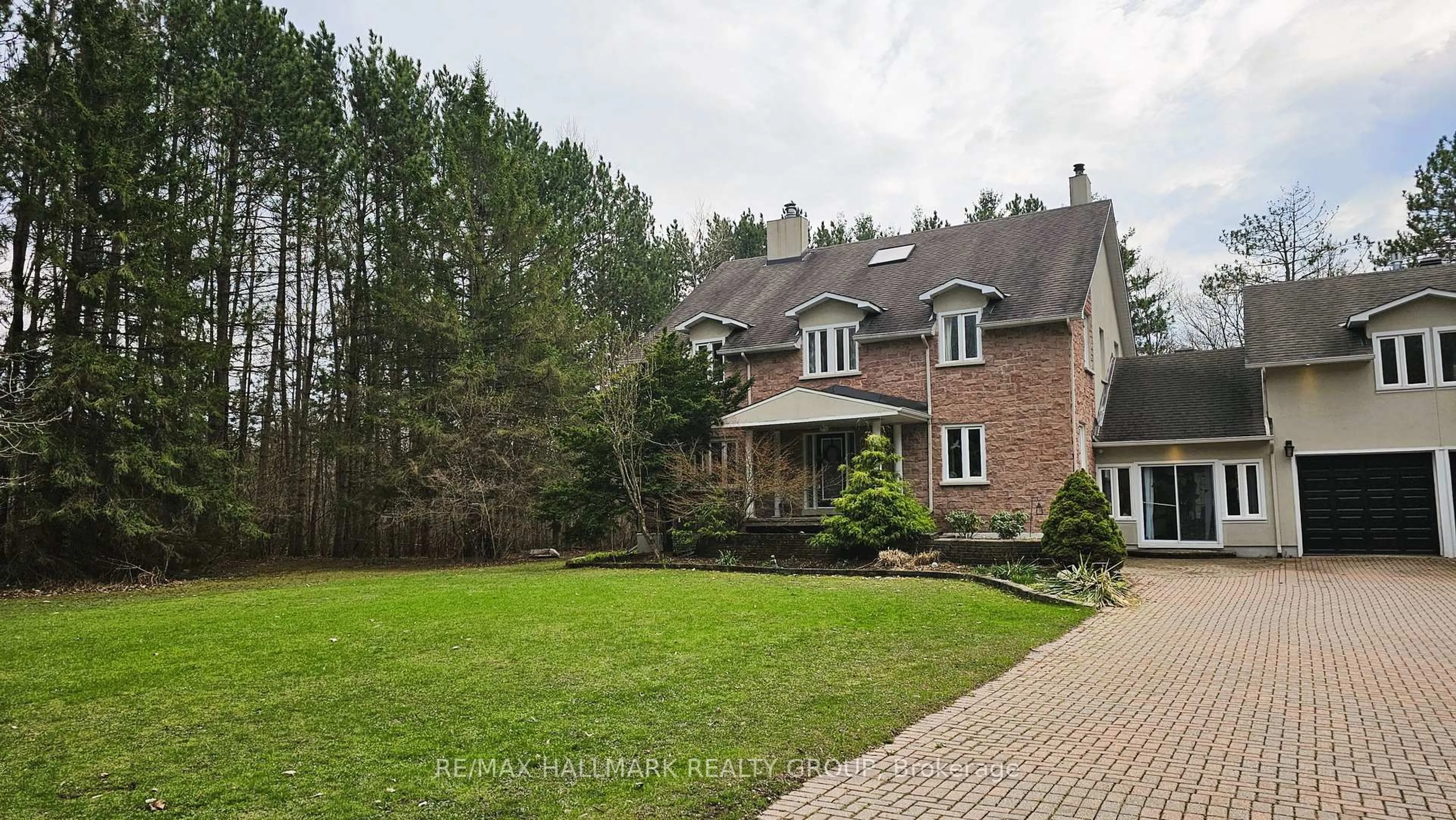 Home with brick exterior material, street for 1390 Lough Dr, Ottawa Ontario K4C 1A9