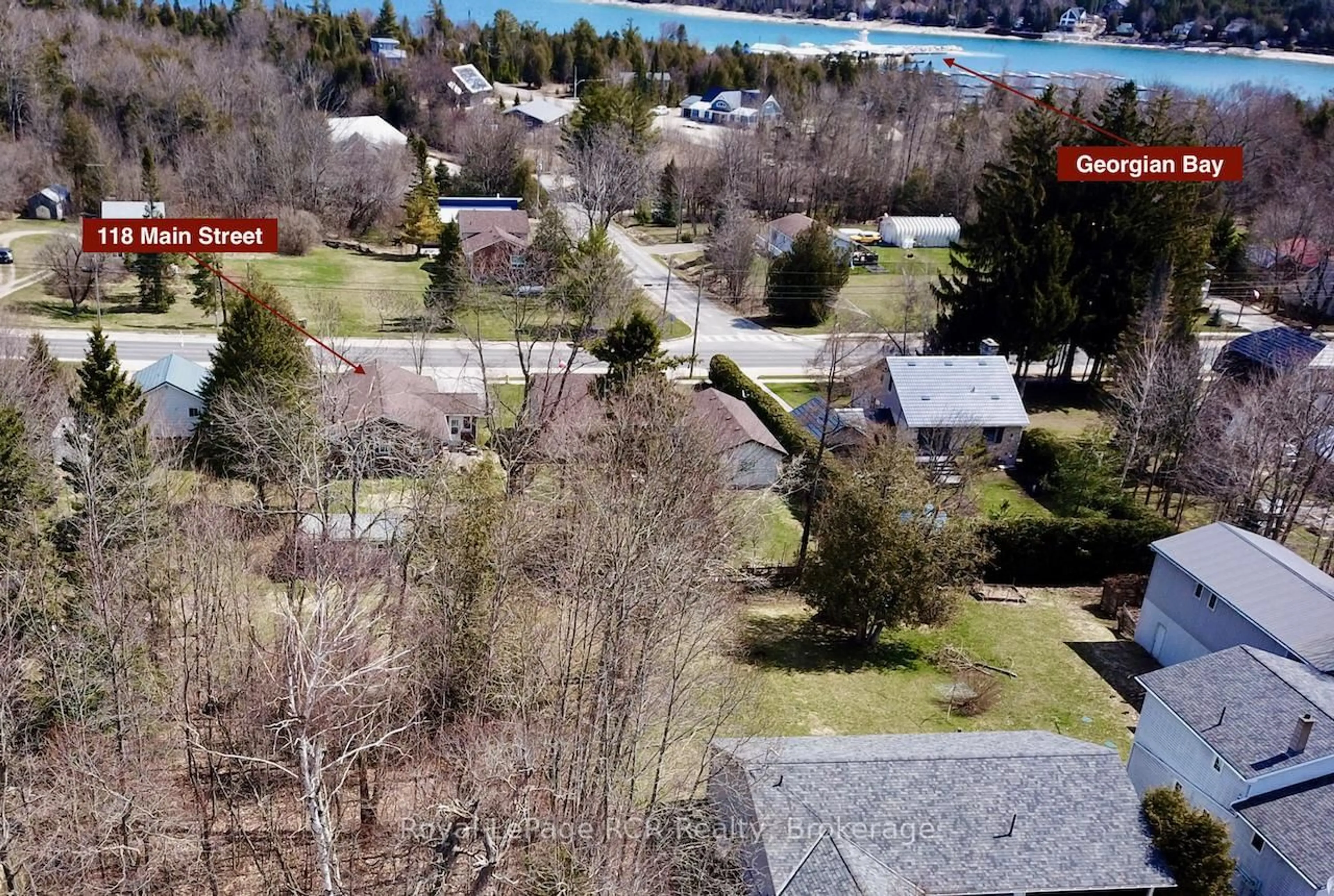 A pic from outside/outdoor area/front of a property/back of a property/a pic from drone, water/lake/river/ocean view for 118 Main St, Northern Bruce Peninsula Ontario N0H 1W0
