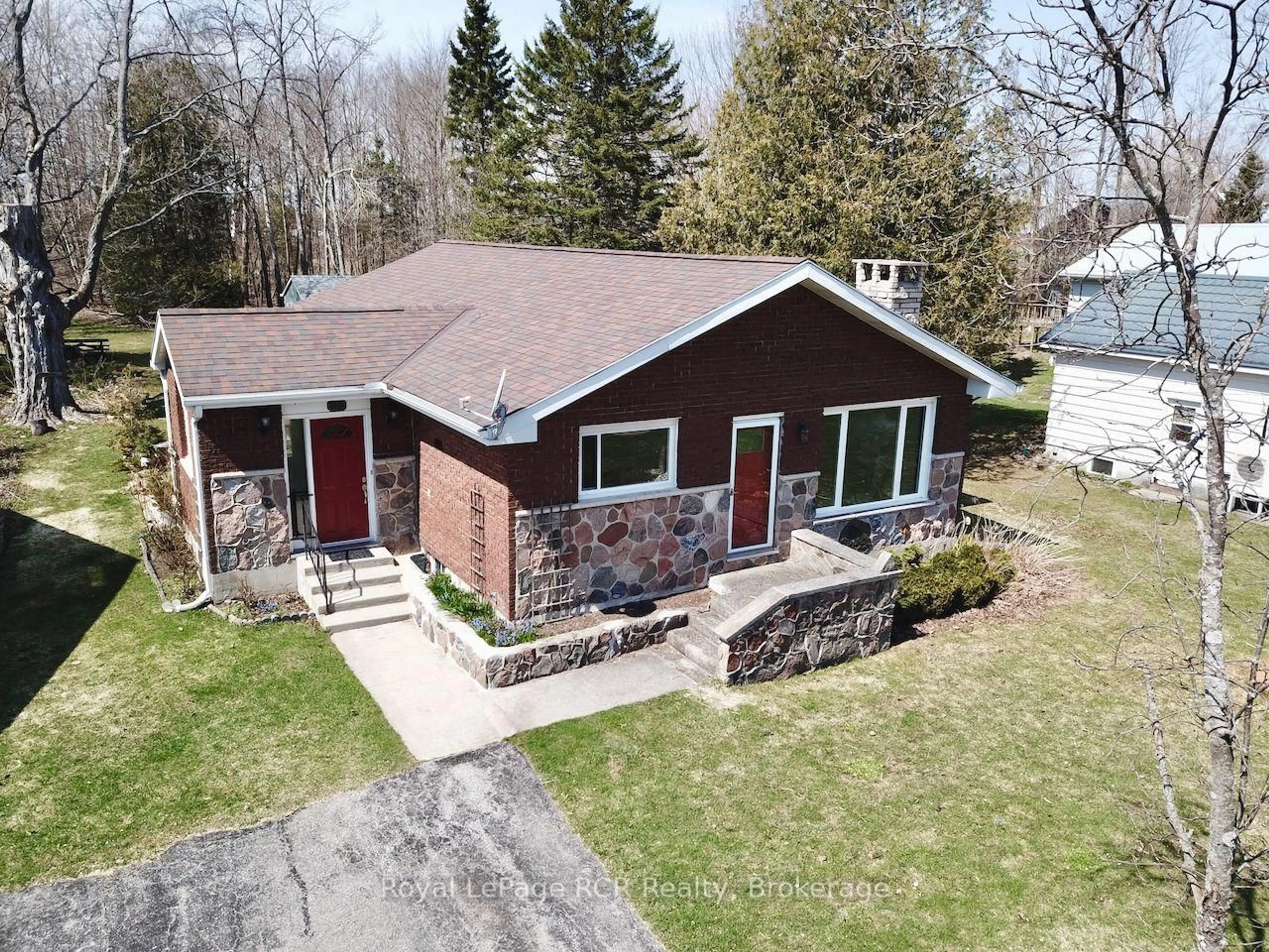 A pic from outside/outdoor area/front of a property/back of a property/a pic from drone, street for 118 Main St, Northern Bruce Peninsula Ontario N0H 1W0