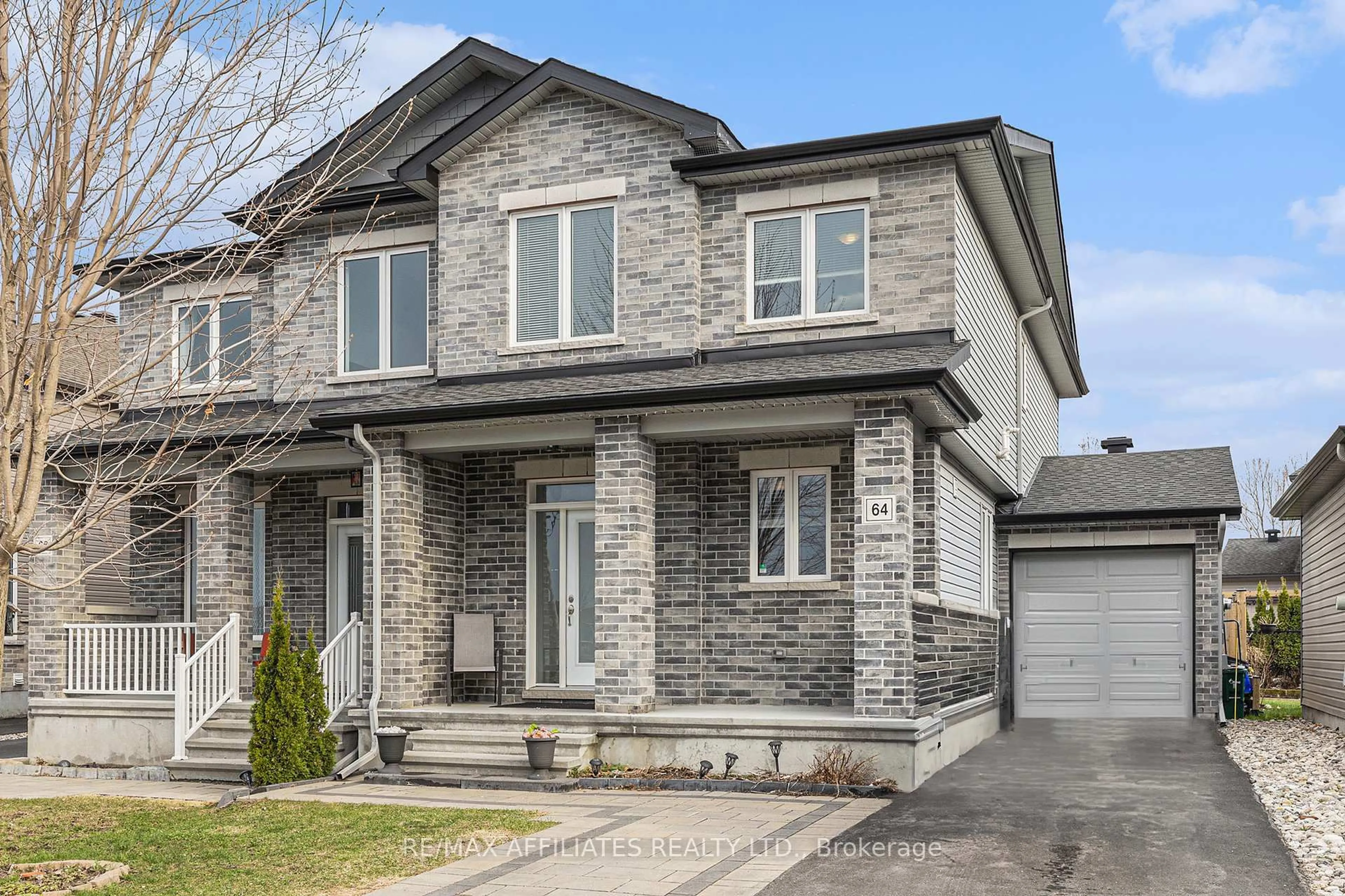 Home with brick exterior material, street for 64 WATERSHIELD Rdge, Ottawa Ontario K2J 5A4