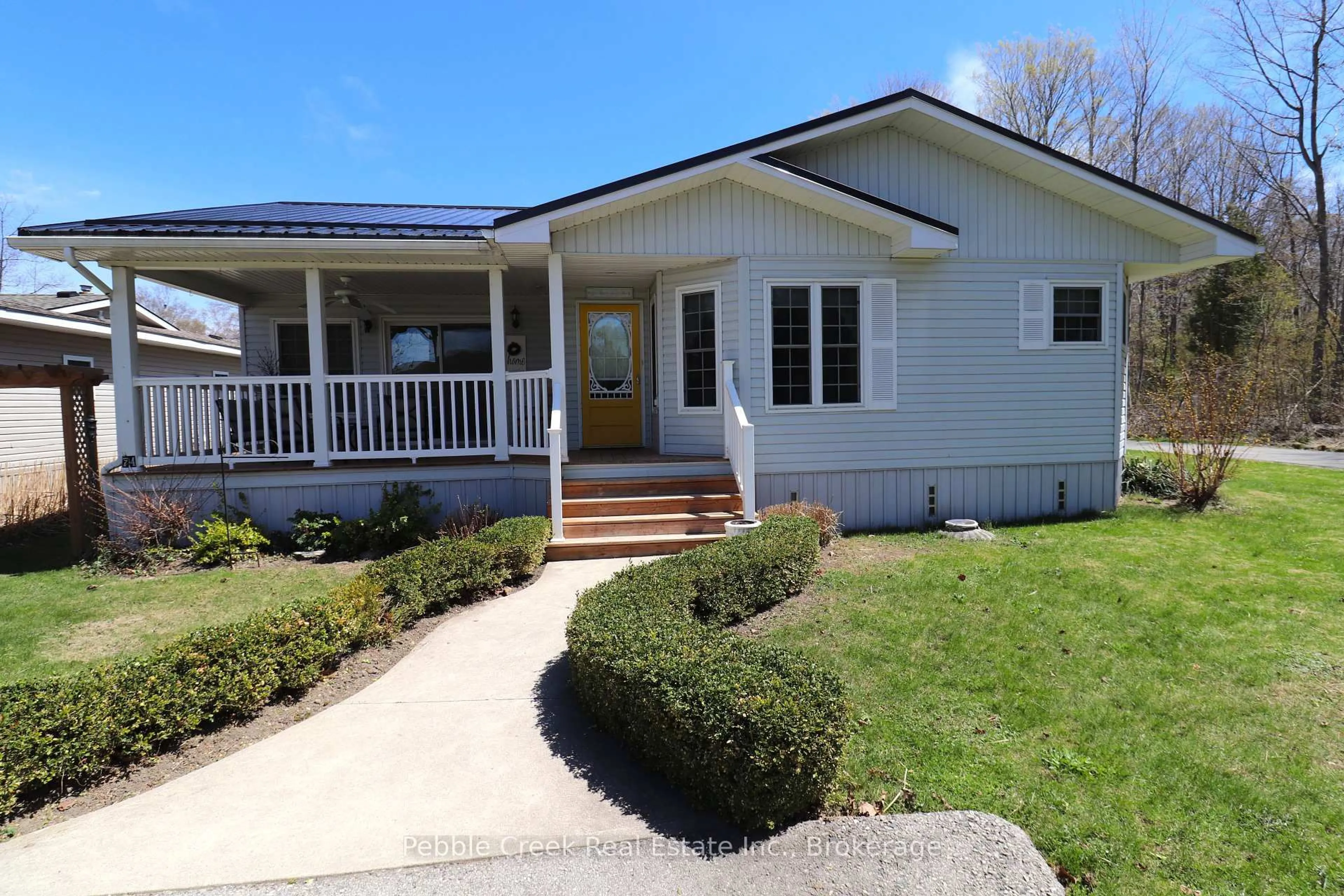 Home with vinyl exterior material, street for 74 Iroquois Lane, Ashfield-Colborne-Wawanosh Ontario N7A 3Y2