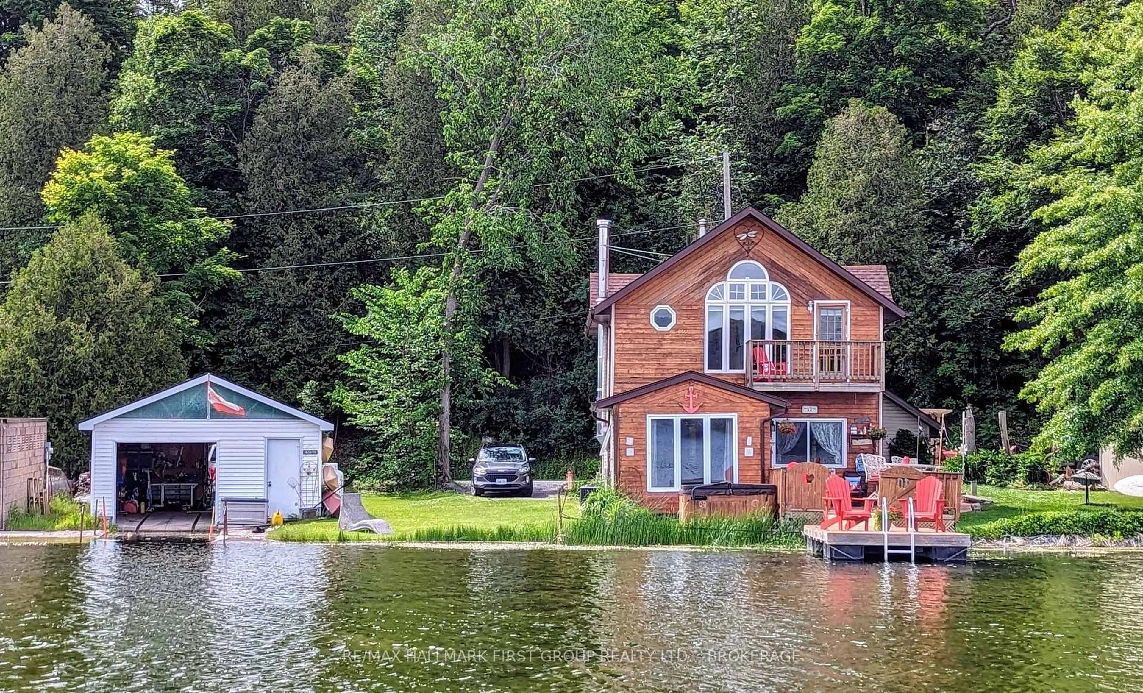 A pic from outside/outdoor area/front of a property/back of a property/a pic from drone, water/lake/river/ocean view for 3340 Loughborough Dr, Mcdonalds Corners Ontario K0H 1M0