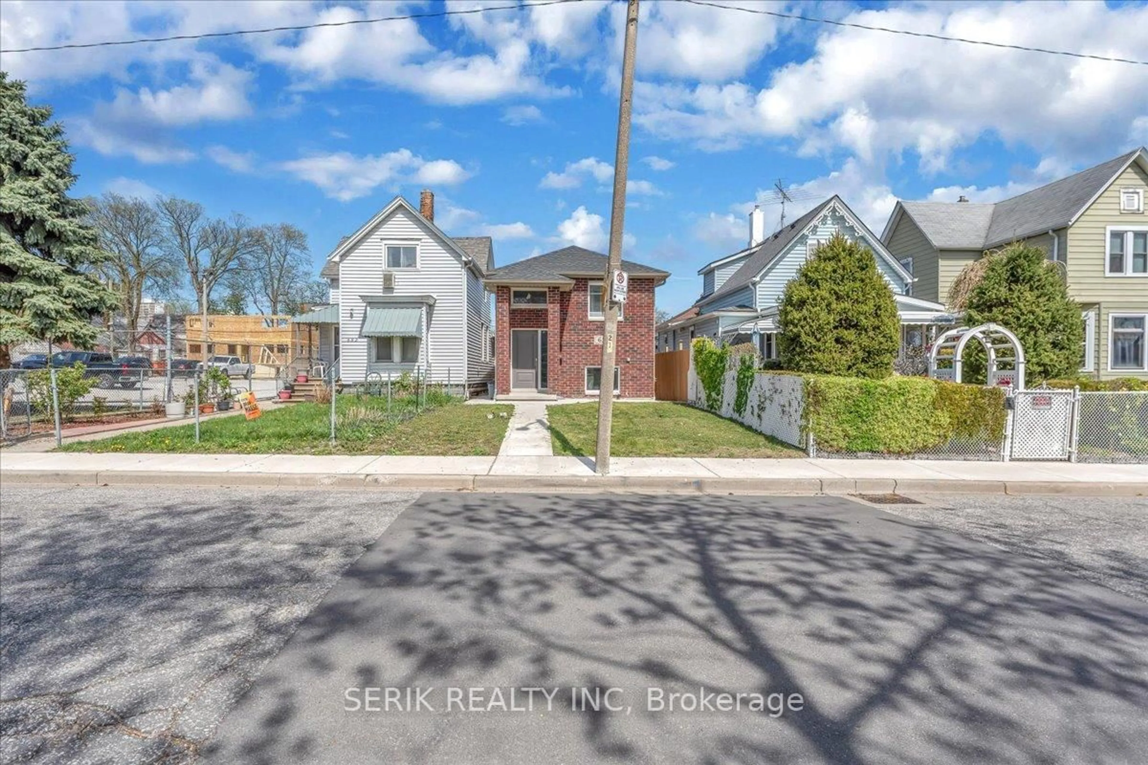 Home with brick exterior material, street for 658 Caron Ave, Windsor Ontario N9A 5B6