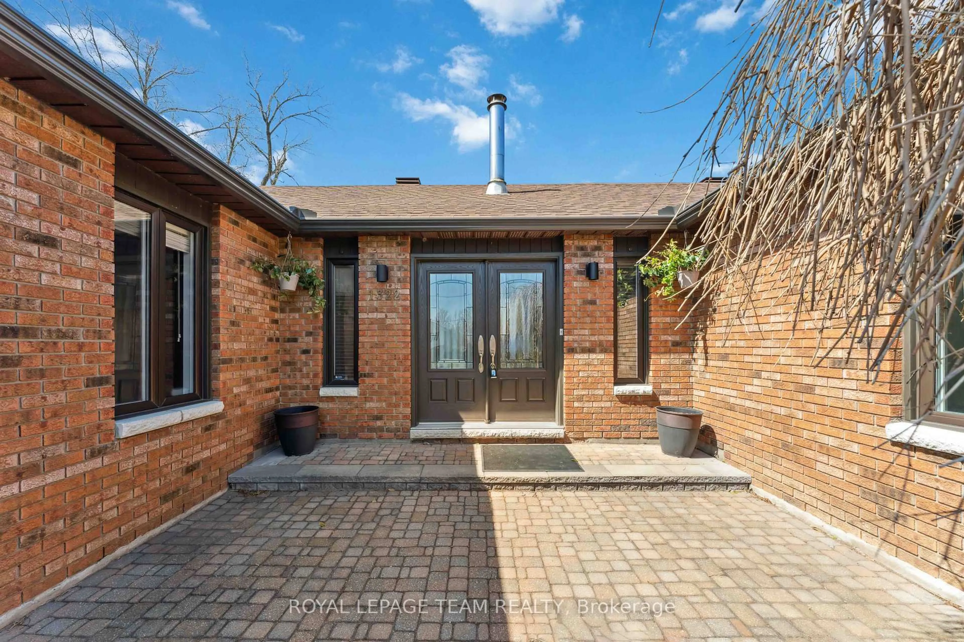 Home with brick exterior material, street for 1322 Johnston Dr, Greely Ontario K4P 1A4