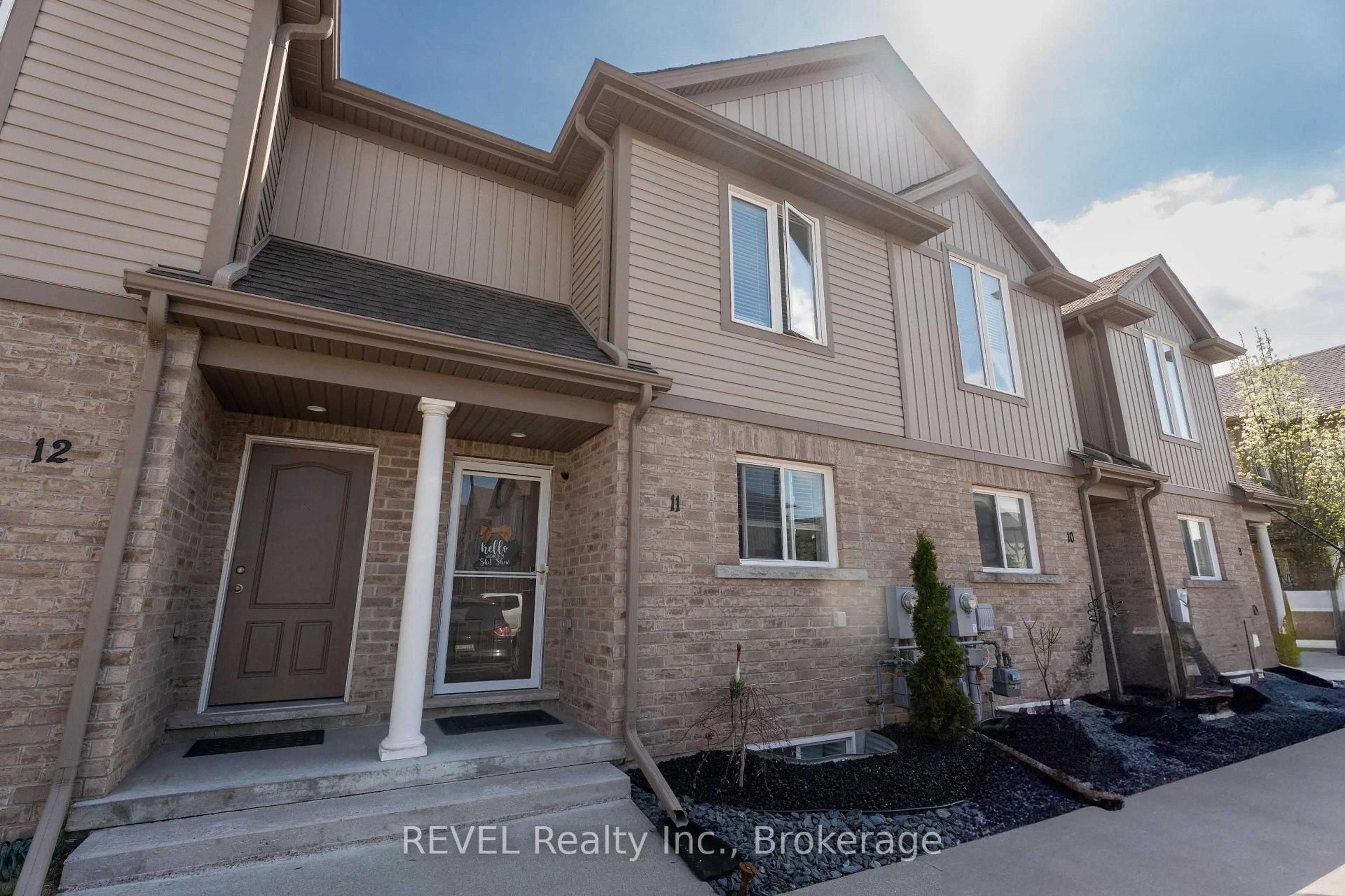 Home with brick exterior material, street for 6118 Kelsey Cres #11, Niagara Falls Ontario L2H 0M6