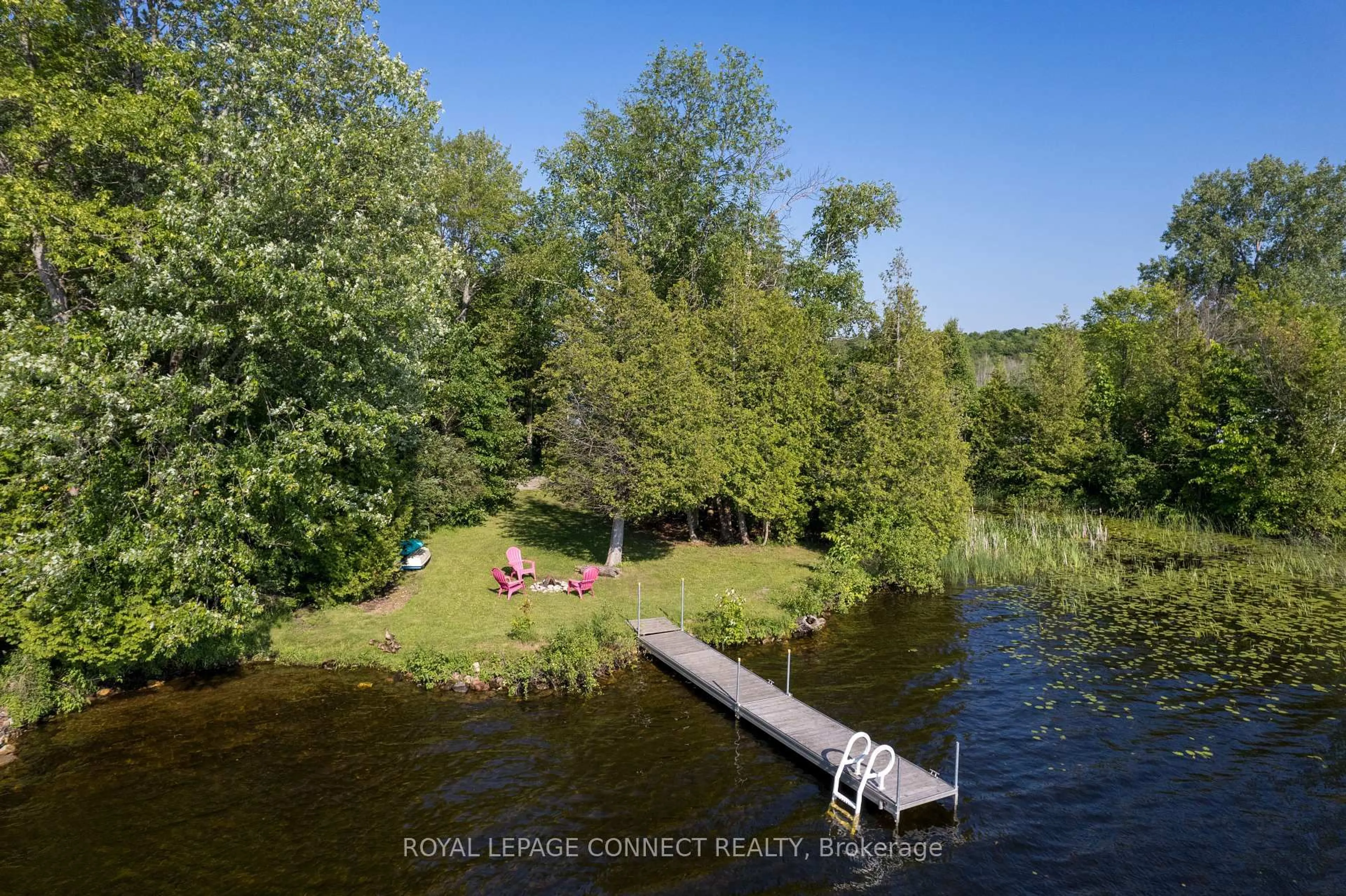 A pic from outside/outdoor area/front of a property/back of a property/a pic from drone, water/lake/river/ocean view for 1049 Johnston Rd, Arden Ontario K0H 1B0
