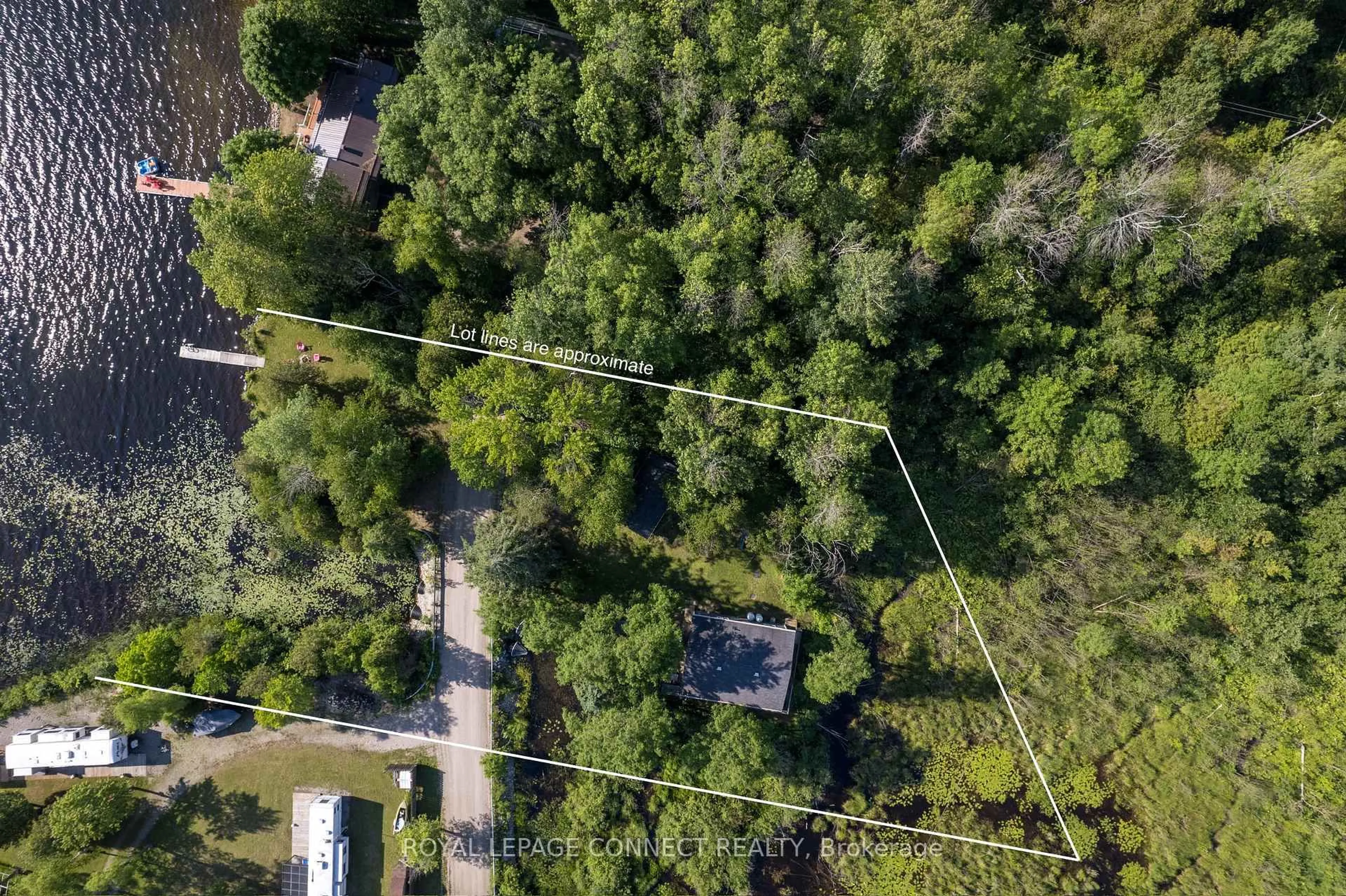 A pic from outside/outdoor area/front of a property/back of a property/a pic from drone, forest/trees view for 1049 Johnston Rd, Arden Ontario K0H 1B0