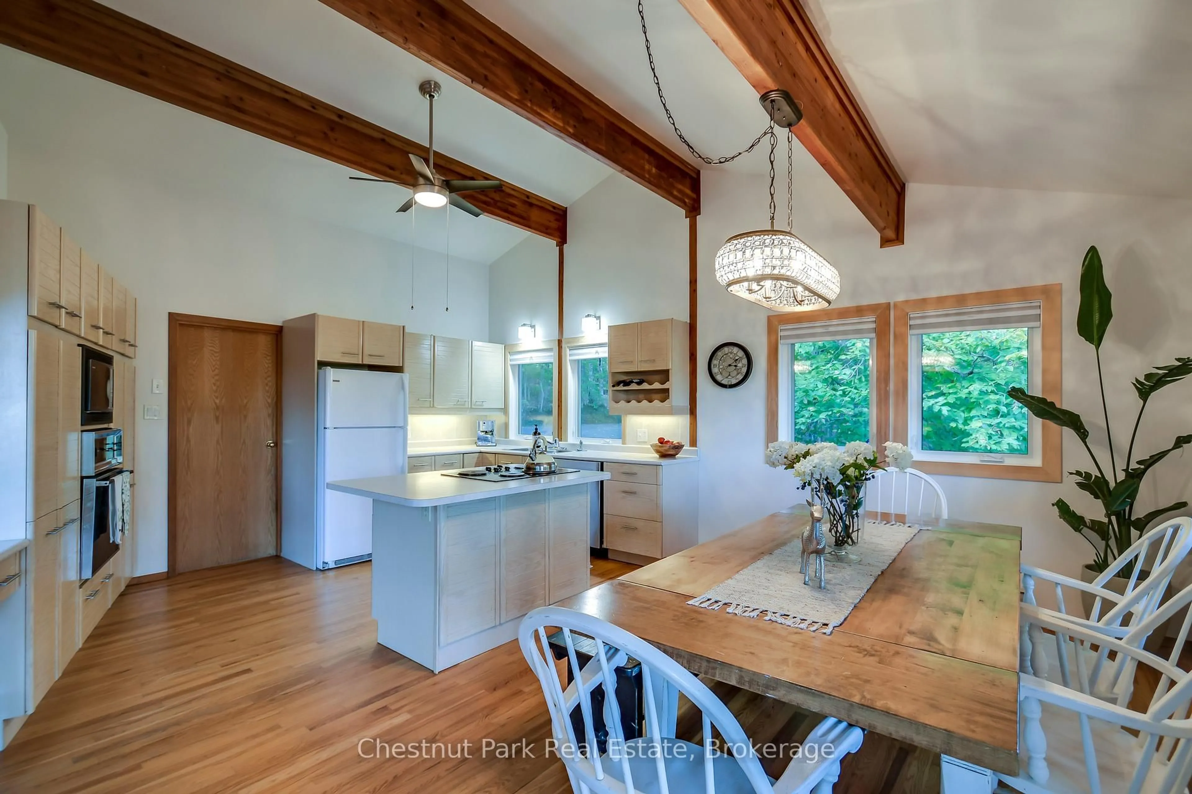 Open concept kitchen, wood/laminate floor for 1033 Point Ideal Rd, Lake of Bays Ontario P0A 1H0