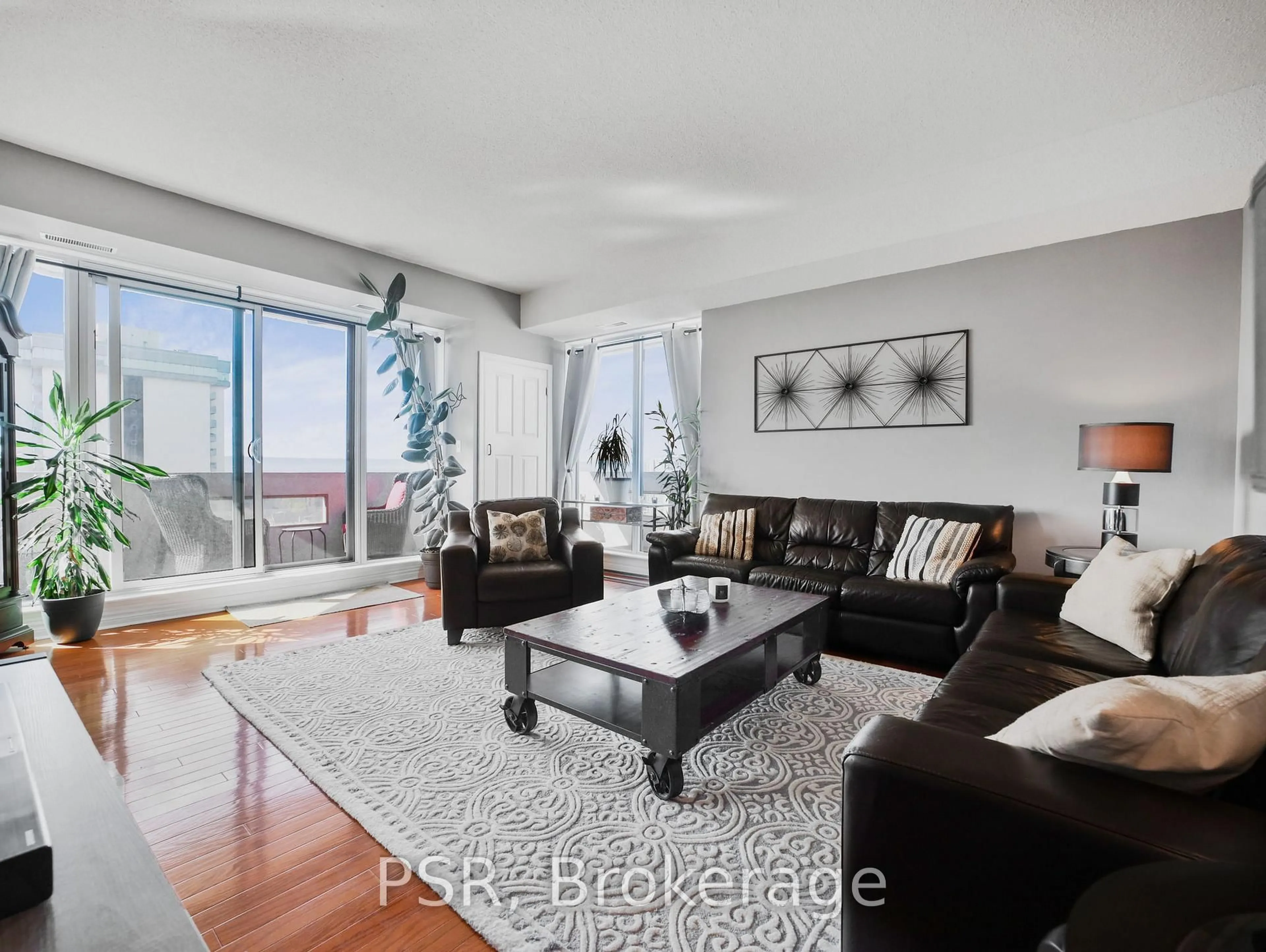 Living room with furniture, unknown for 67 Caroline St #17D, Hamilton Ontario L8P 3K6