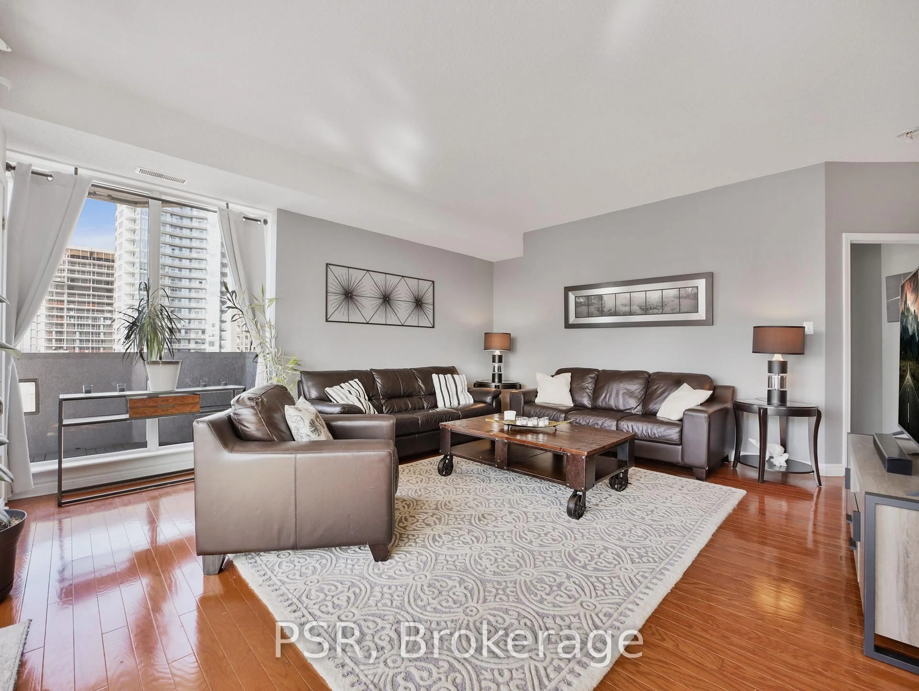 Living room with furniture, unknown for 67 Caroline St #17D, Hamilton Ontario L8P 3K6