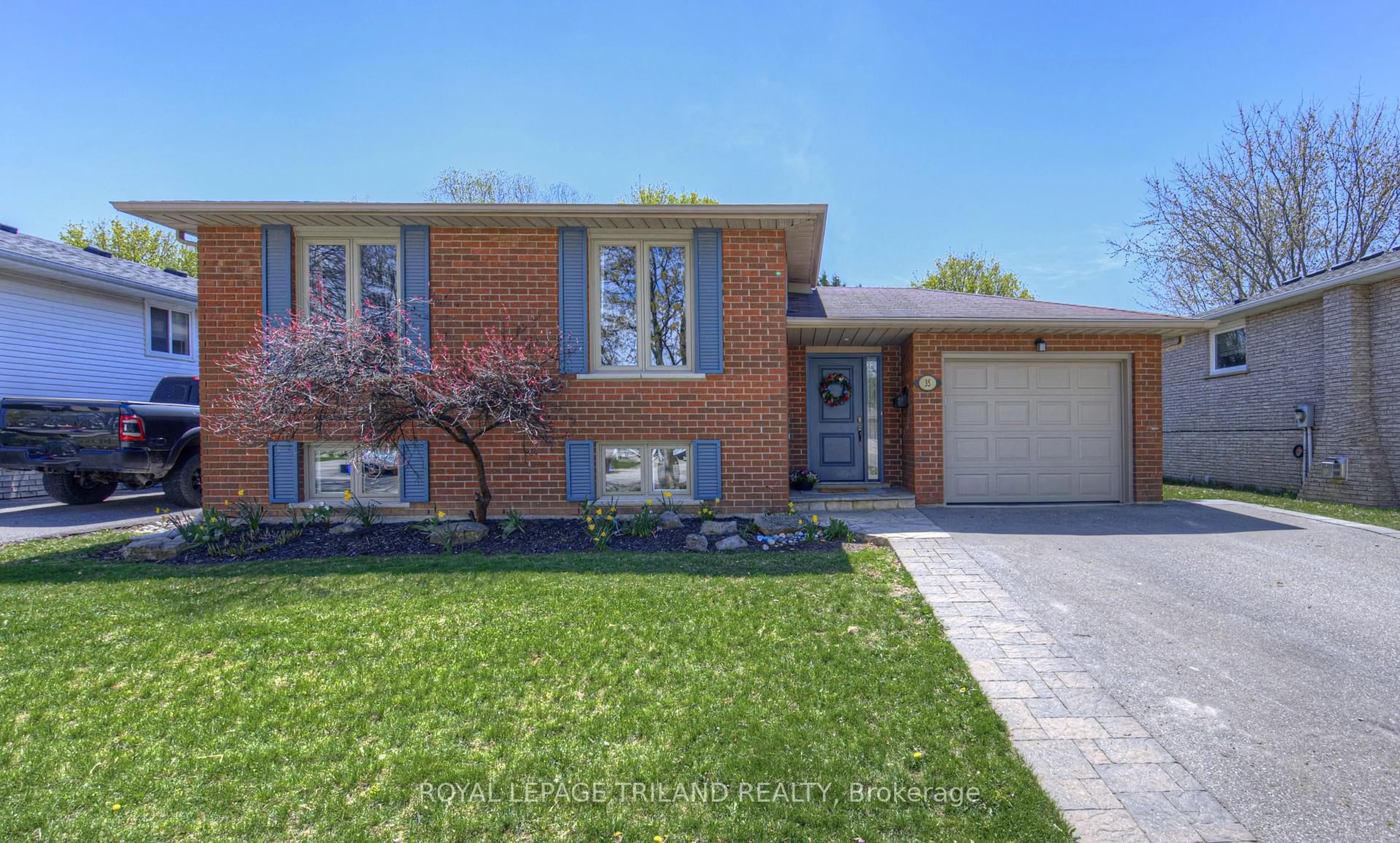 Home with brick exterior material, street for 35 Sympatica Cres, Brantford Ontario N3P 1P6