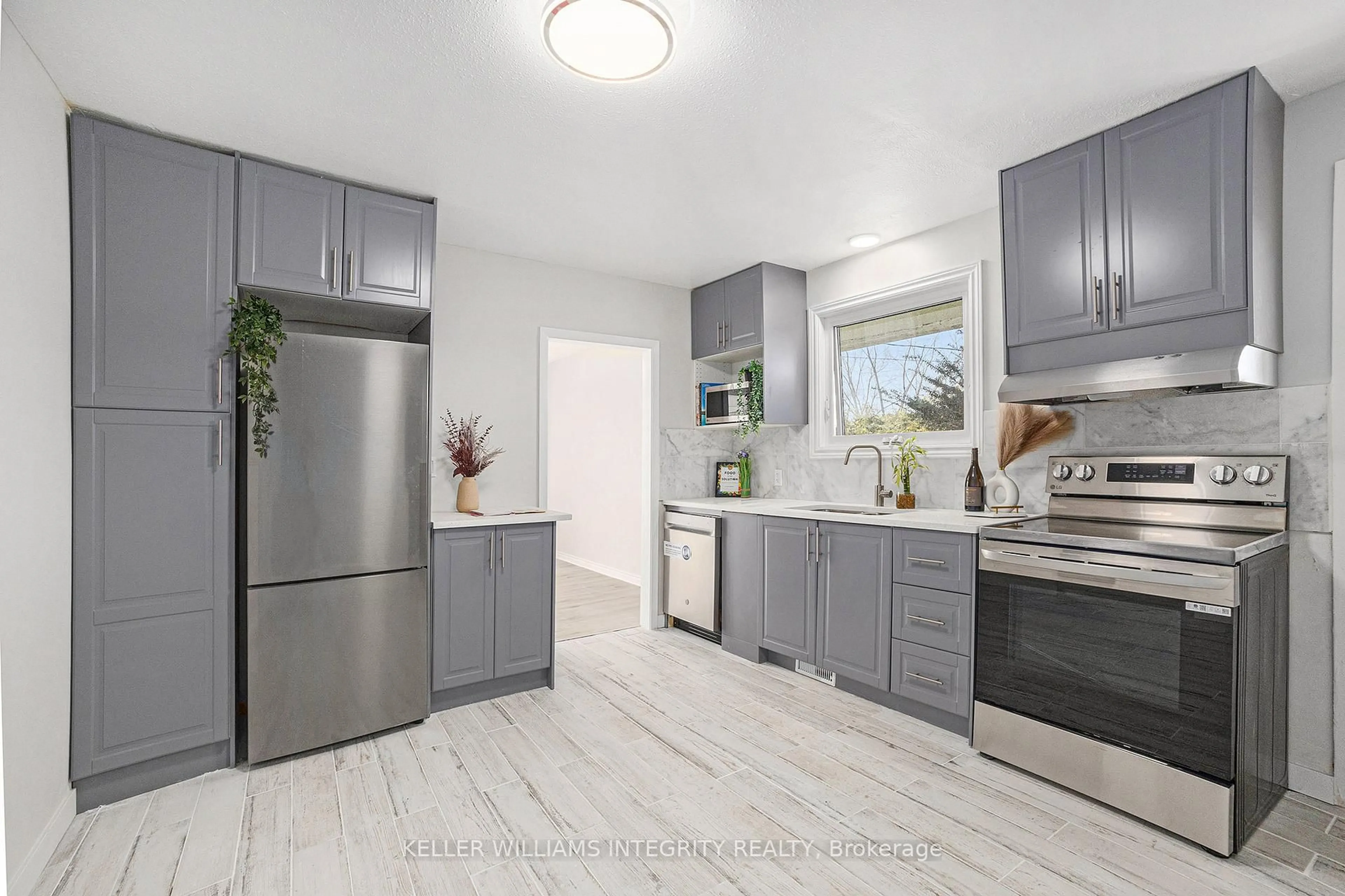 Open concept kitchen, ceramic/tile floor for 1401 Lowen Dr, Ottawa Ontario K1V 1H3