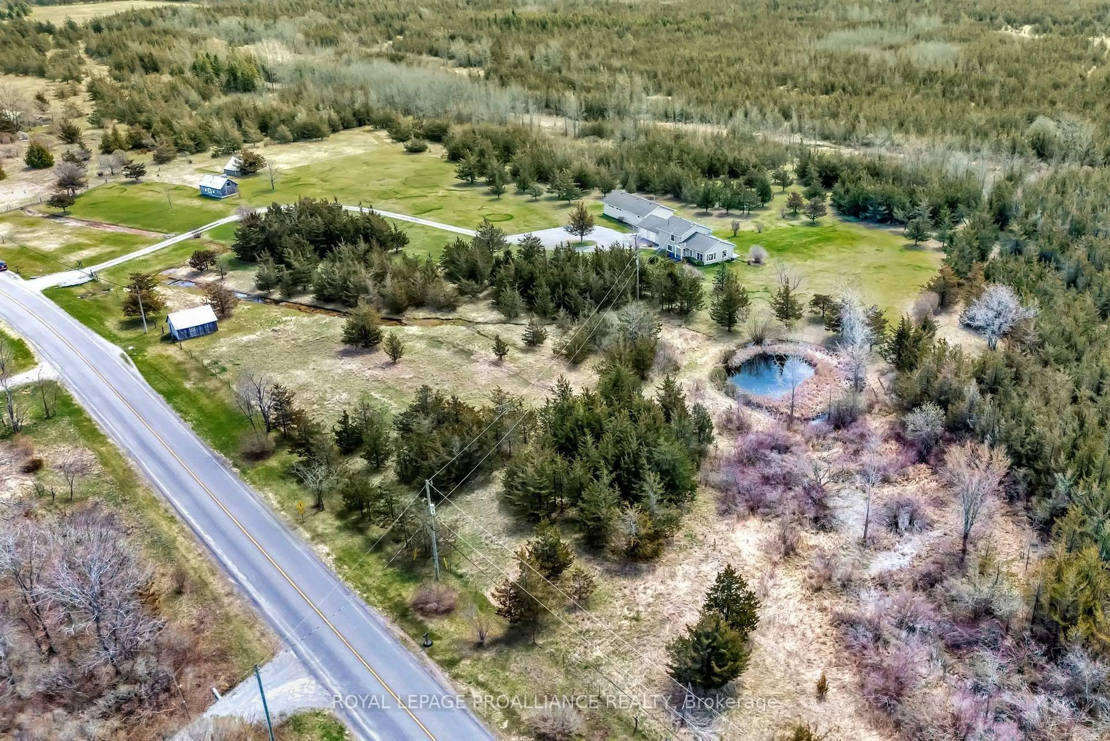 A pic from outside/outdoor area/front of a property/back of a property/a pic from drone, unknown for 2508 County Rd 7 Rd, Prince Edward County Ontario K0K 2T0