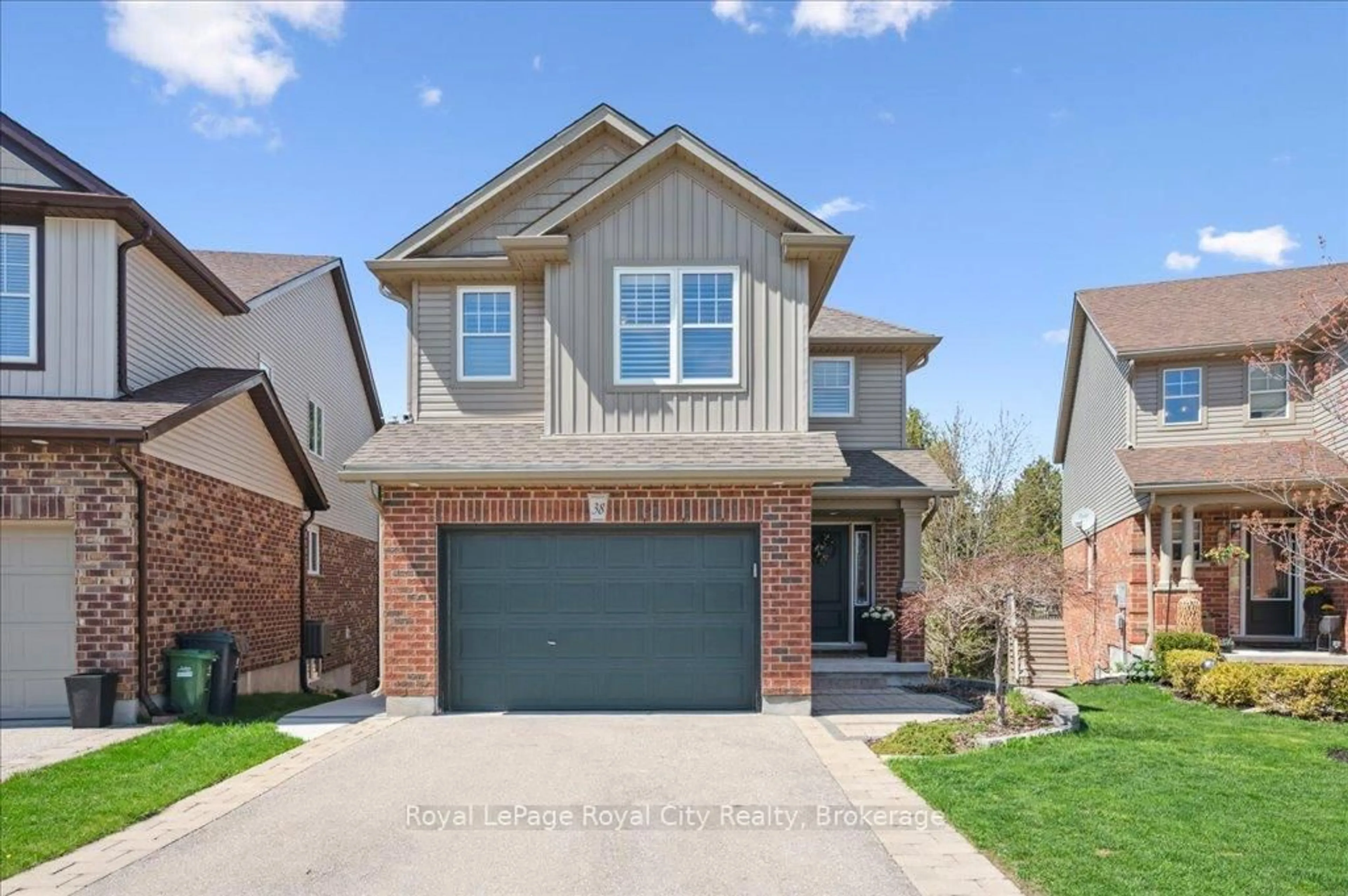 Home with brick exterior material, street for 38 Marshall Dr, Guelph Ontario N1E 0K7