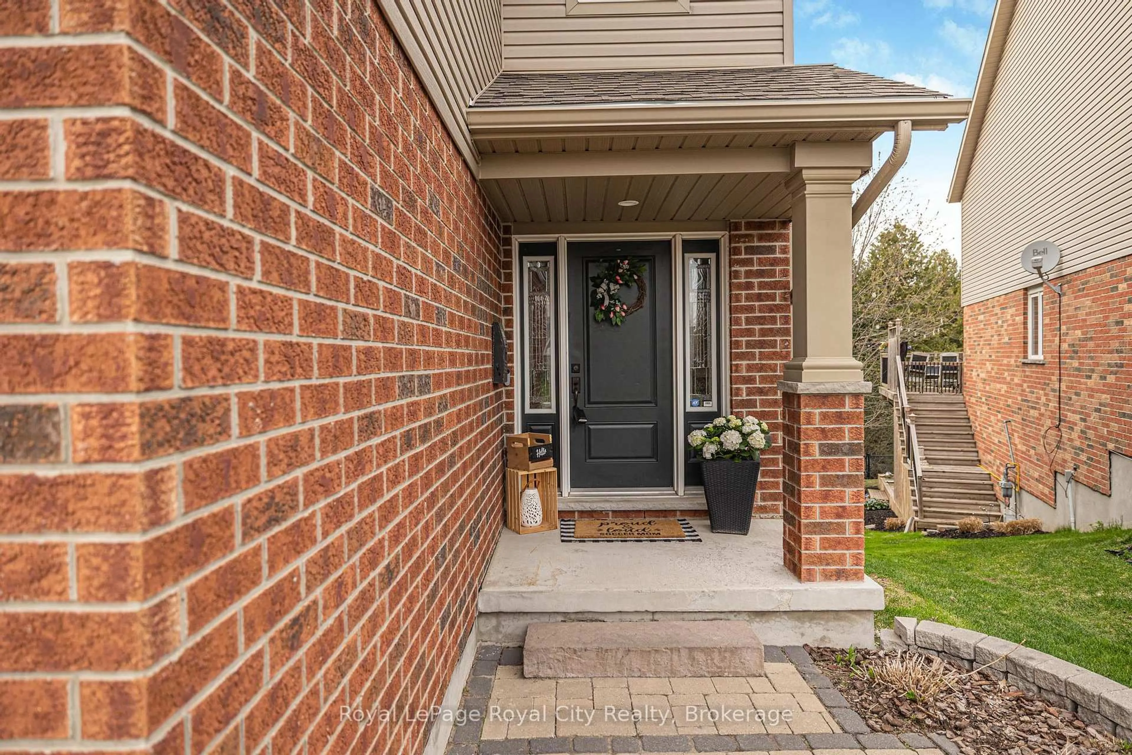 Home with brick exterior material, street for 38 Marshall Dr, Guelph Ontario N1E 0K7