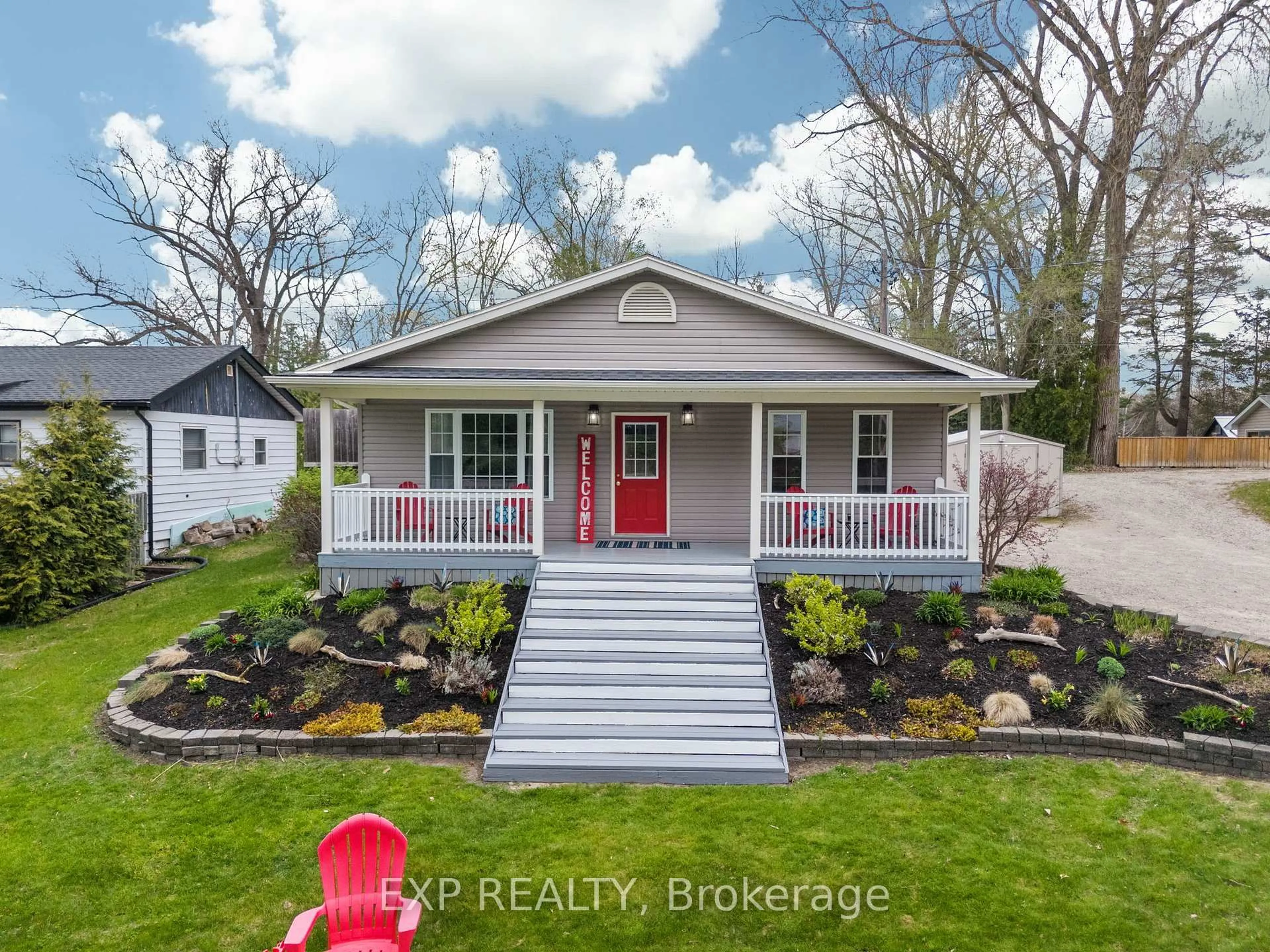 Home with vinyl exterior material, street for 7652 Riverside Dr, Lambton Shores Ontario N0M 2L0