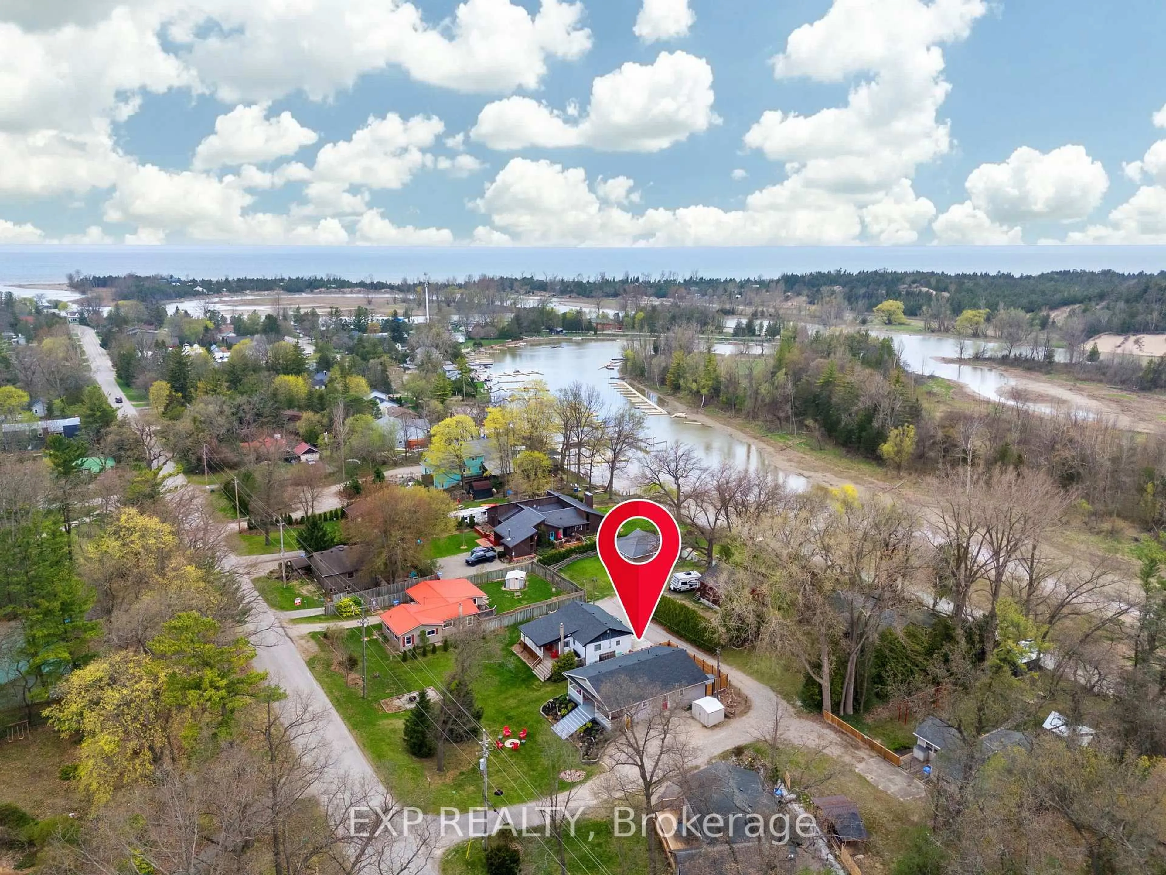A pic from outside/outdoor area/front of a property/back of a property/a pic from drone, water/lake/river/ocean view for 7652 Riverside Dr, Lambton Shores Ontario N0M 2L0