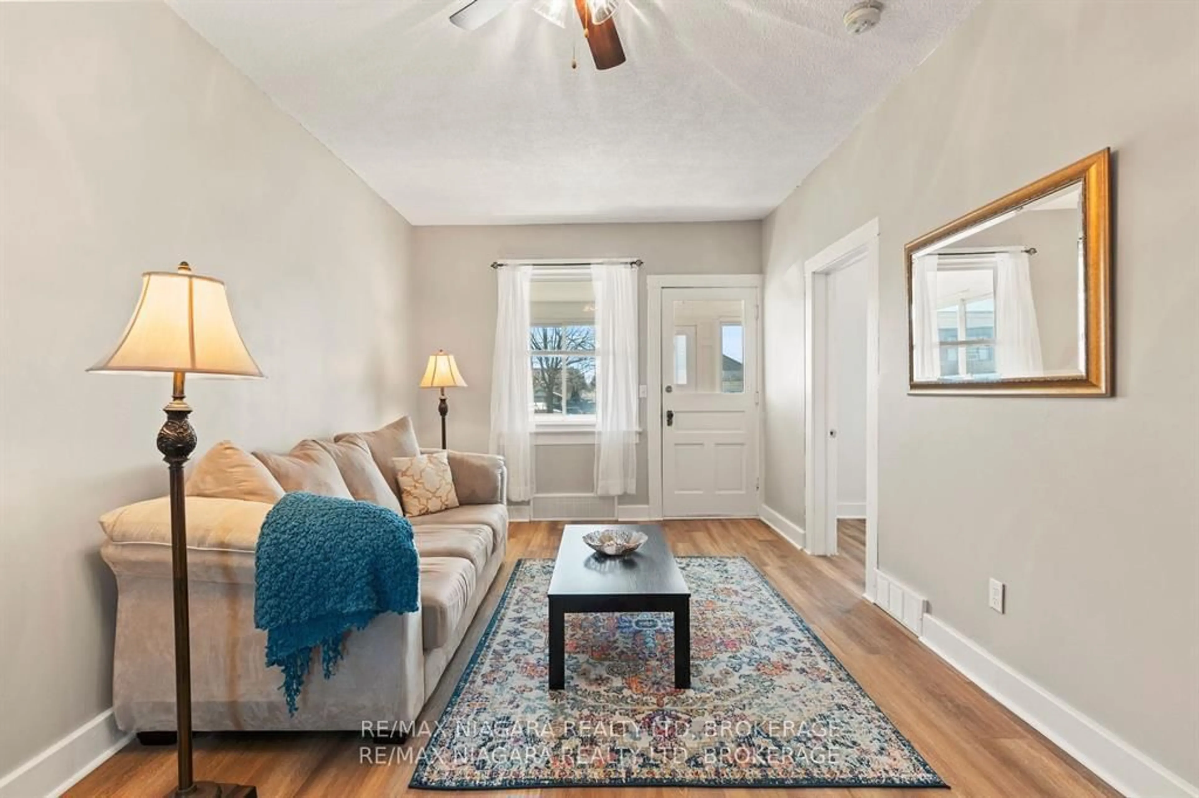Living room with furniture, unknown for 28 ANN St, Thorold Ontario L2V 2J5