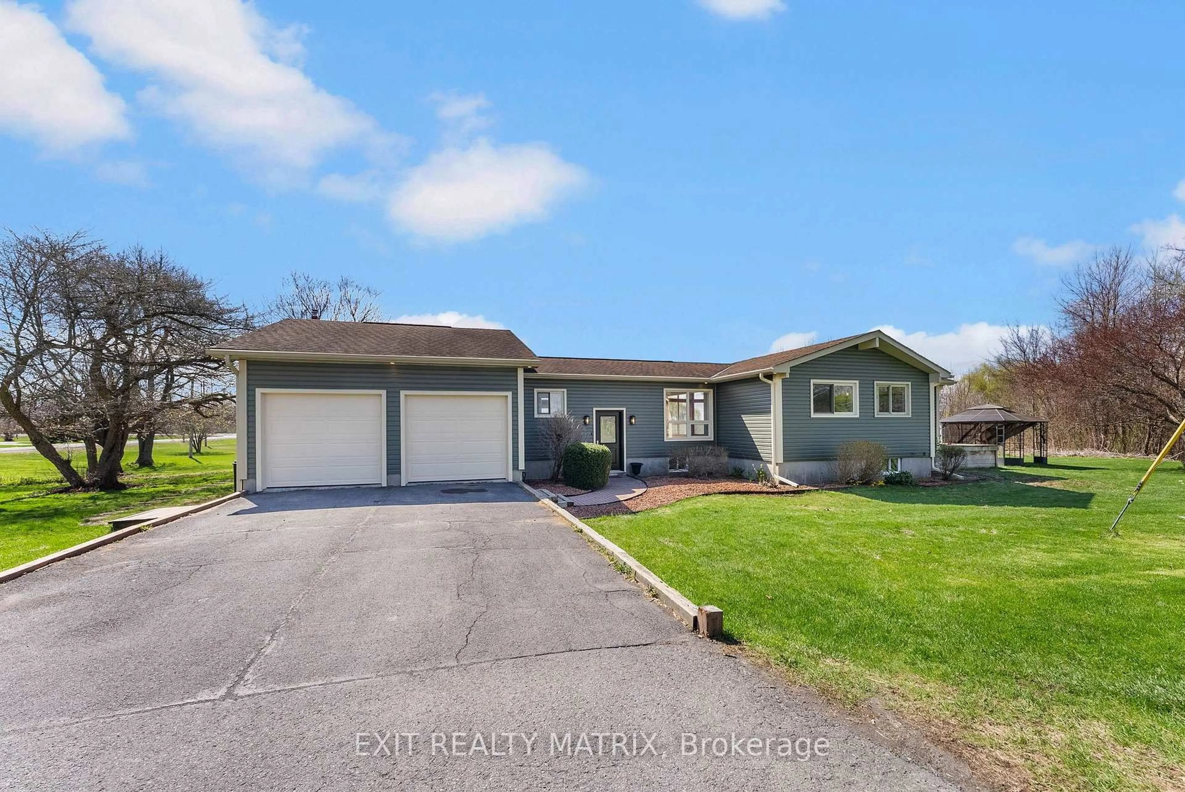 A pic from outside/outdoor area/front of a property/back of a property/a pic from drone, street for 15474 Manning Rd, South Stormont Ontario K0C 1M0