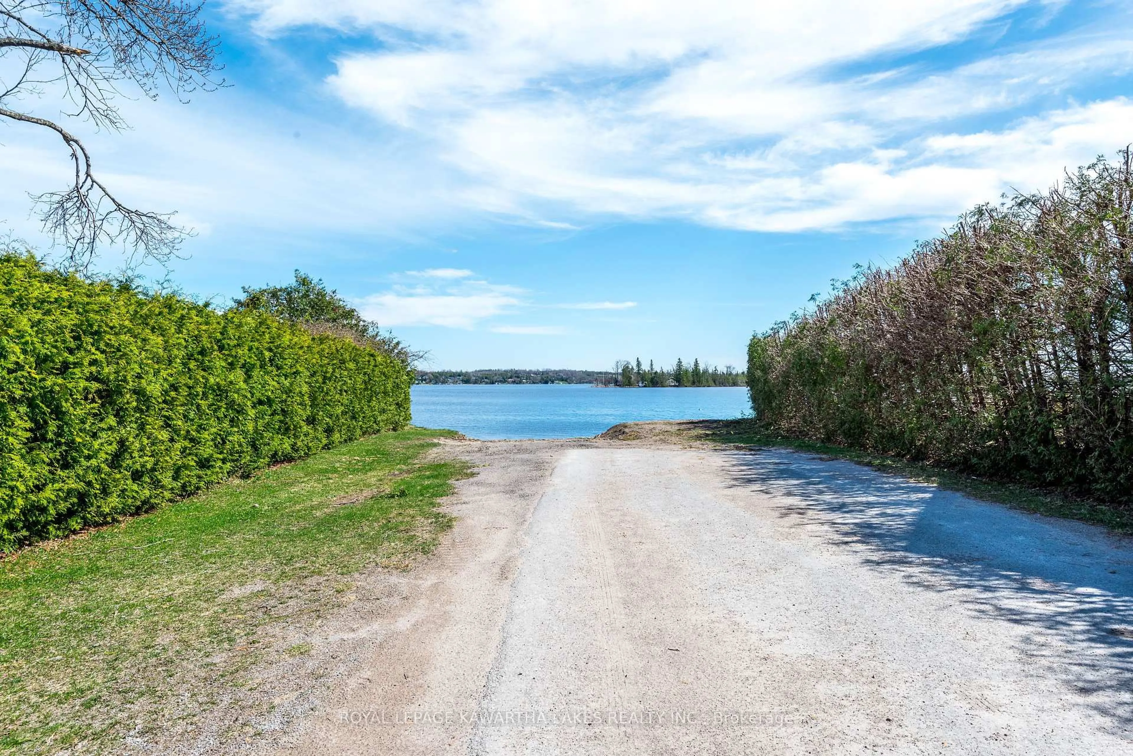A pic from outside/outdoor area/front of a property/back of a property/a pic from drone, water/lake/river/ocean view for 85 Thomas Dr, Kawartha Lakes Ontario K0M 1N0