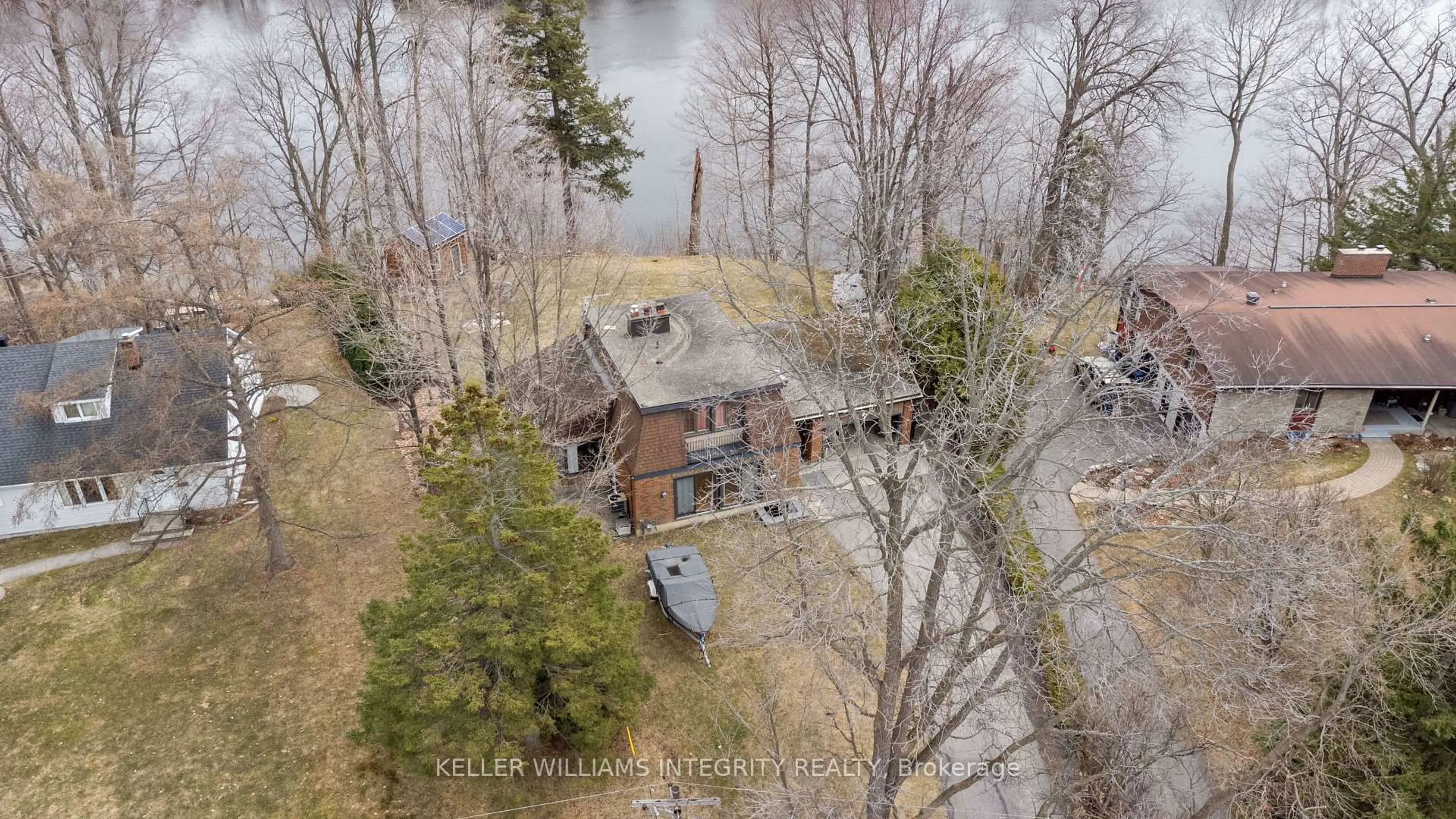 A pic from outside/outdoor area/front of a property/back of a property/a pic from drone, water/lake/river/ocean view for 2061 Prince Of Wales Dr, Ottawa Ontario K2E 7A4