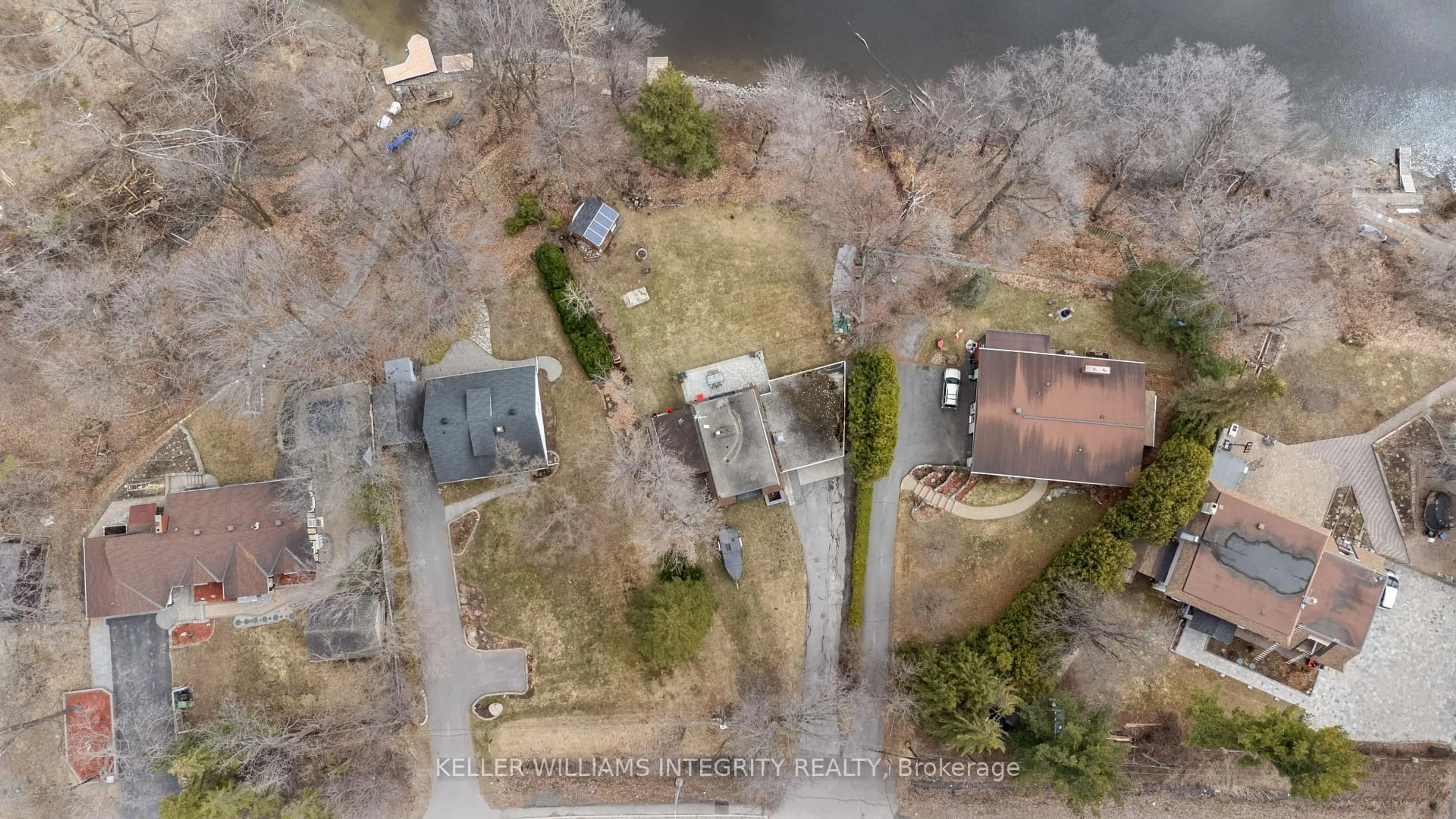 A pic from outside/outdoor area/front of a property/back of a property/a pic from drone, water/lake/river/ocean view for 2061 Prince Of Wales Dr, Ottawa Ontario K2E 7A4
