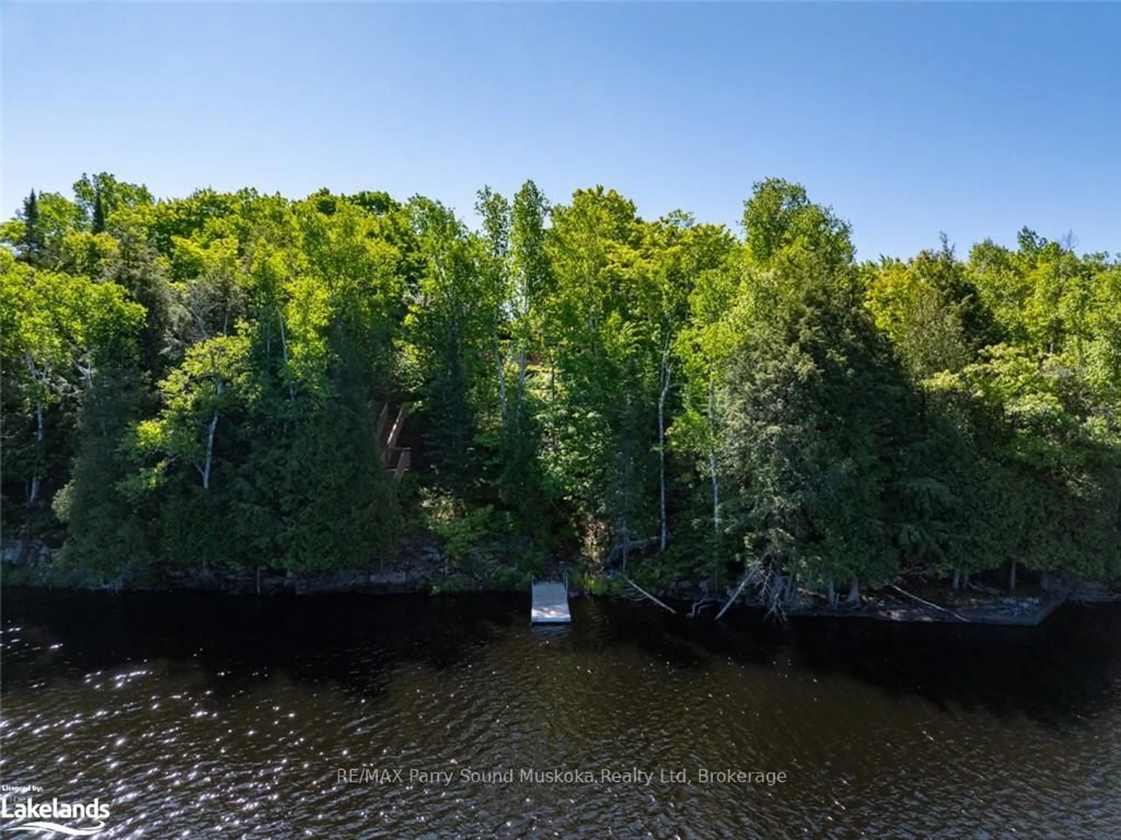 A pic from outside/outdoor area/front of a property/back of a property/a pic from drone, water/lake/river/ocean view for 68 Pinewood Rd, McDougall Ontario P2A 2W7