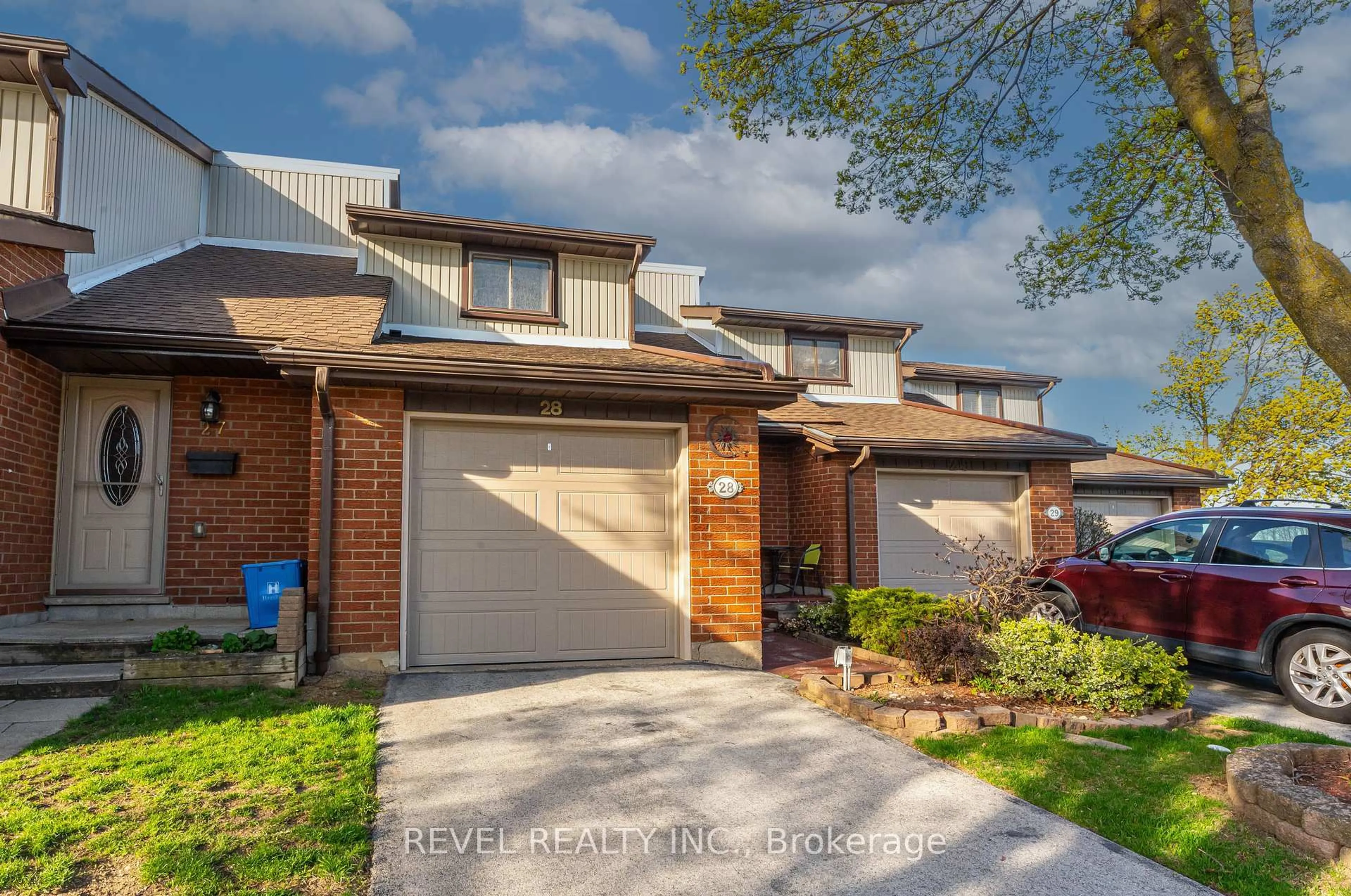 Home with brick exterior material, street for 25 Redbury St #28, Hamilton Ontario L8W 1P7