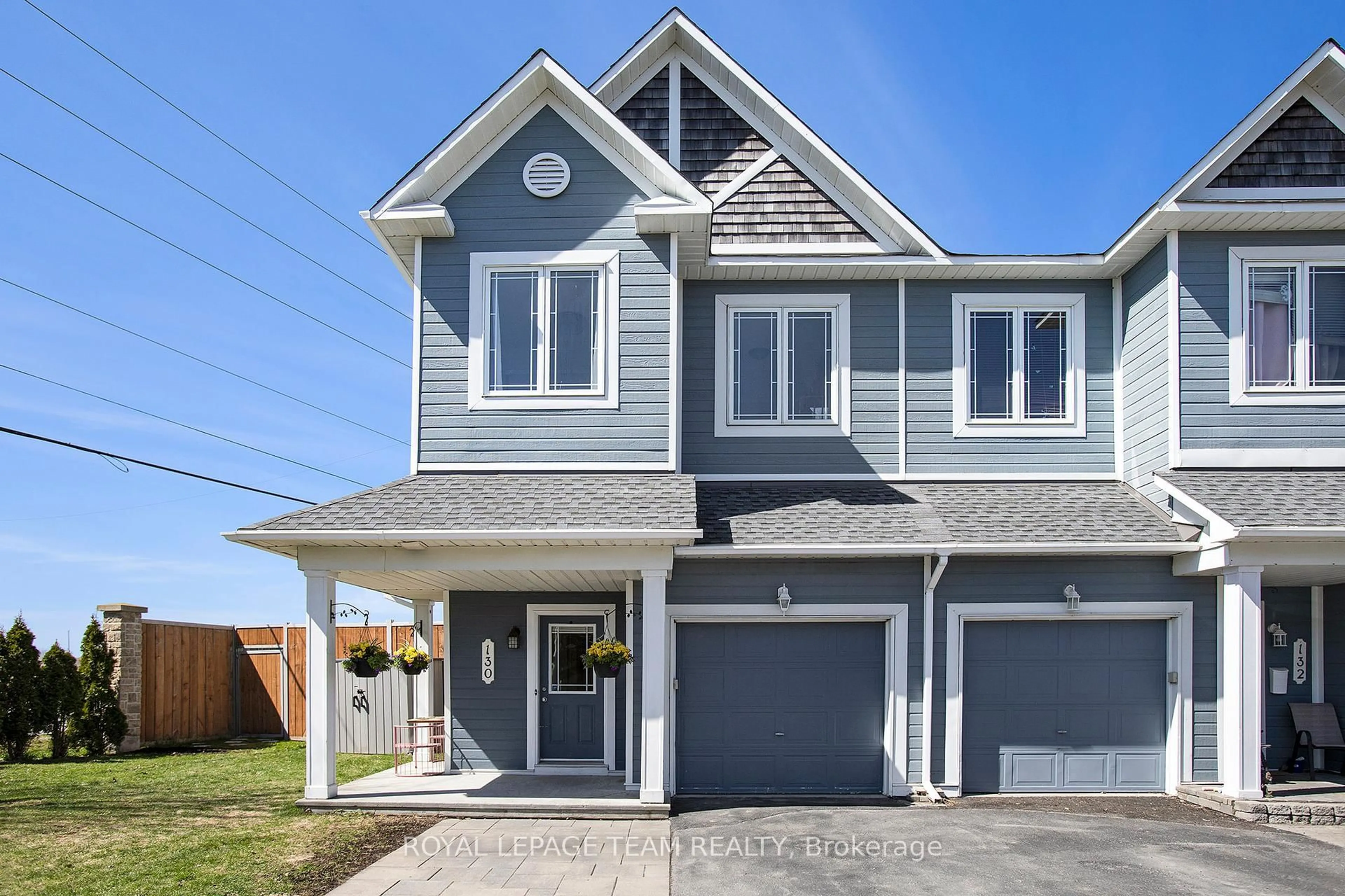 Home with vinyl exterior material, street for 130 Freeport Dr, Ottawa Ontario K2M 0A8