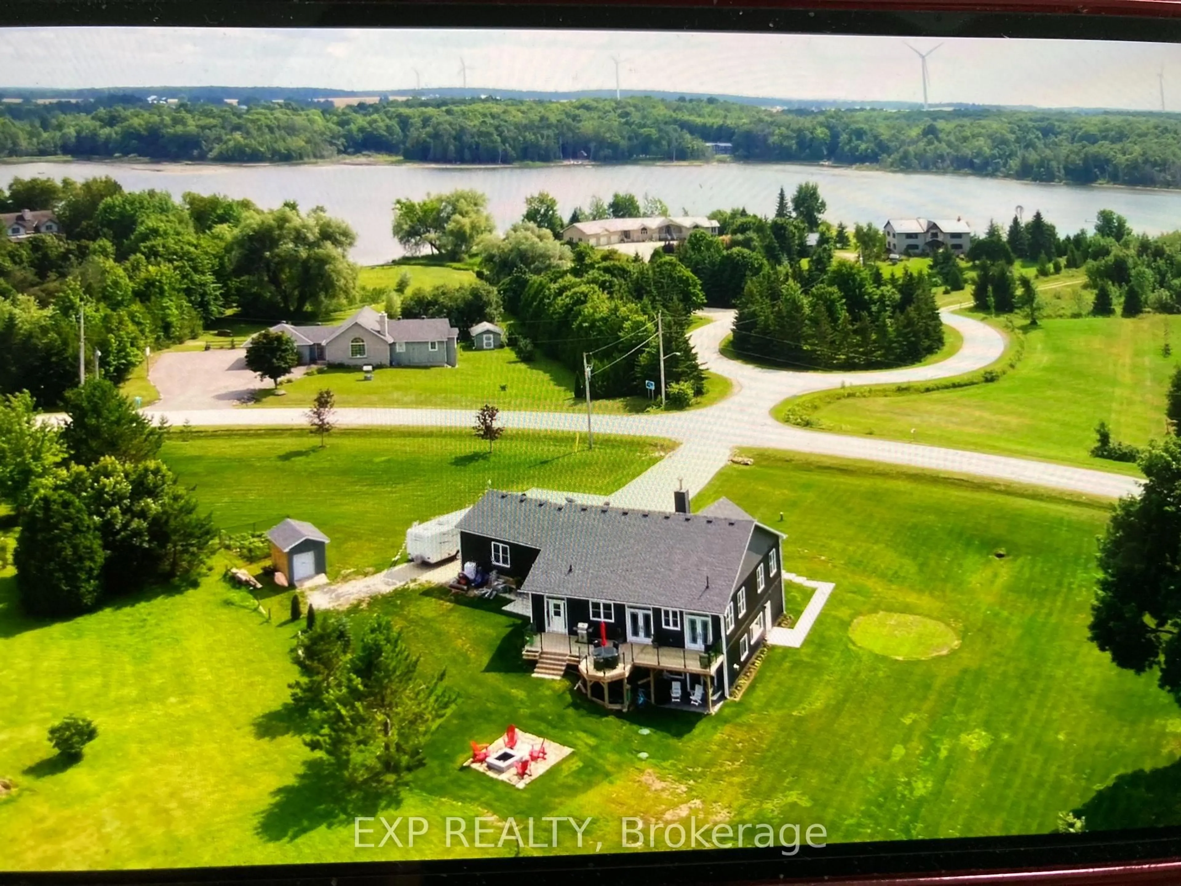 A pic from outside/outdoor area/front of a property/back of a property/a pic from drone, water/lake/river/ocean view for 167 BREWSTER LAKE Rd #Singhampton, Grey Highlands Ontario N0C 1M0